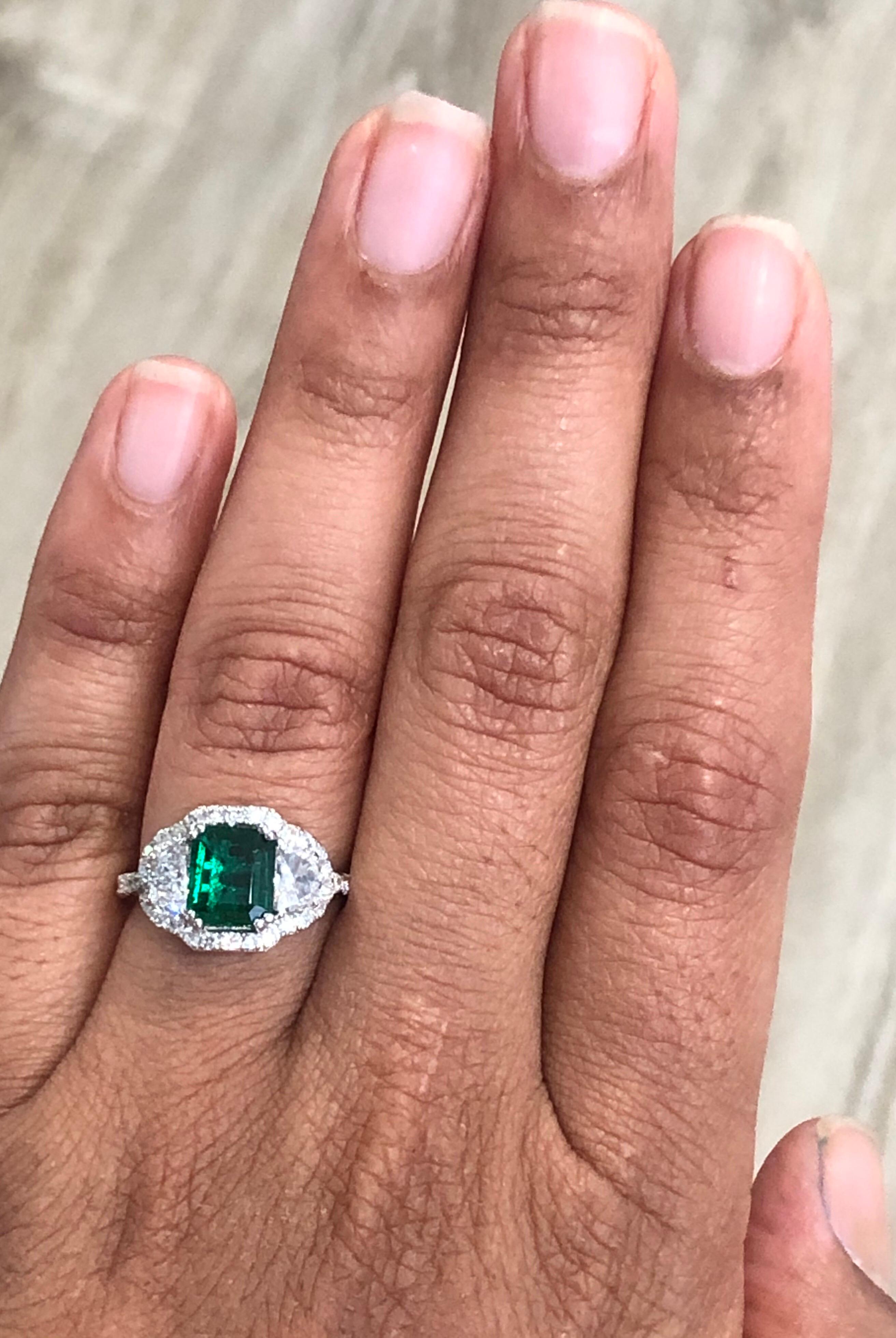 GIA Certified 2.42 Carat Emerald Diamond 18 Karat White Gold Three-Stone Ring In New Condition In Los Angeles, CA