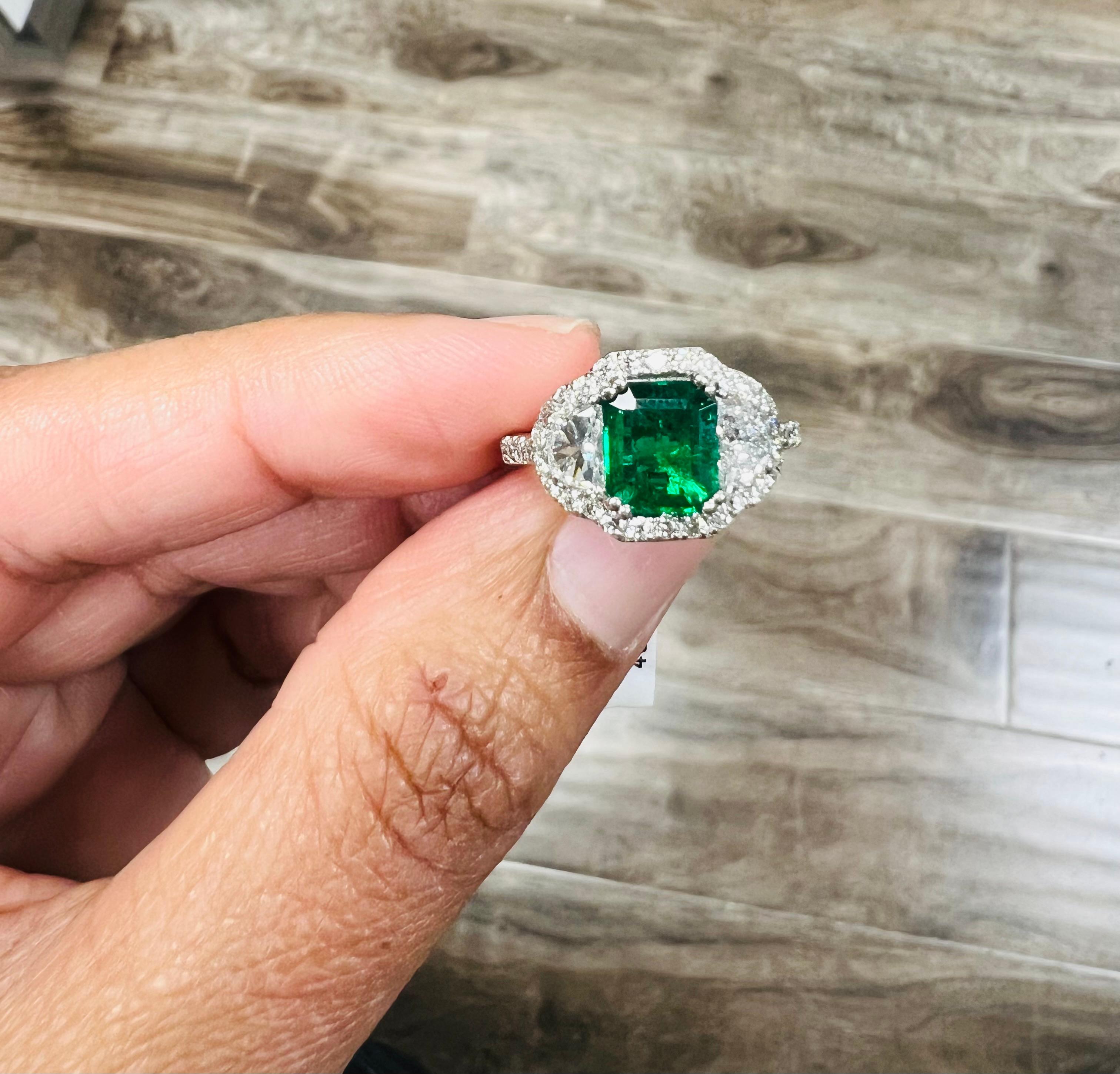 GIA Certified 2.42 Carat Emerald Diamond 18 Karat White Gold Three Stone Ring For Sale 3