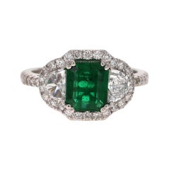 GIA Certified 2.42 Carat Emerald Diamond 18 Karat White Gold Three-Stone Ring