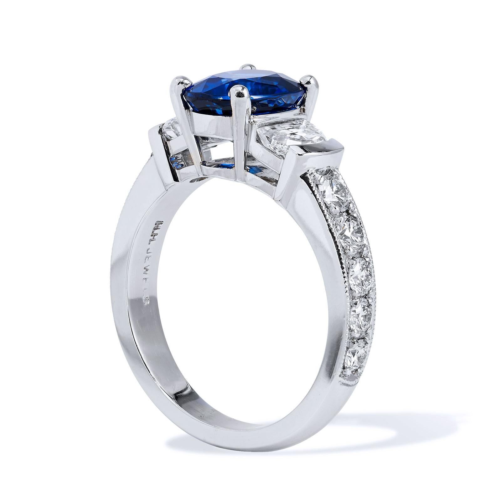 GIA Certified 2.45 Carat Blue Sapphire Diamond Ring Handmade 

This stunning blue sapphire and diamond ring is handmade and one of a kind. 
It features a 2.45 carat blue sapphire which measures (8.79mm x 6.88mm). 
This sapphire is GIA certified. The