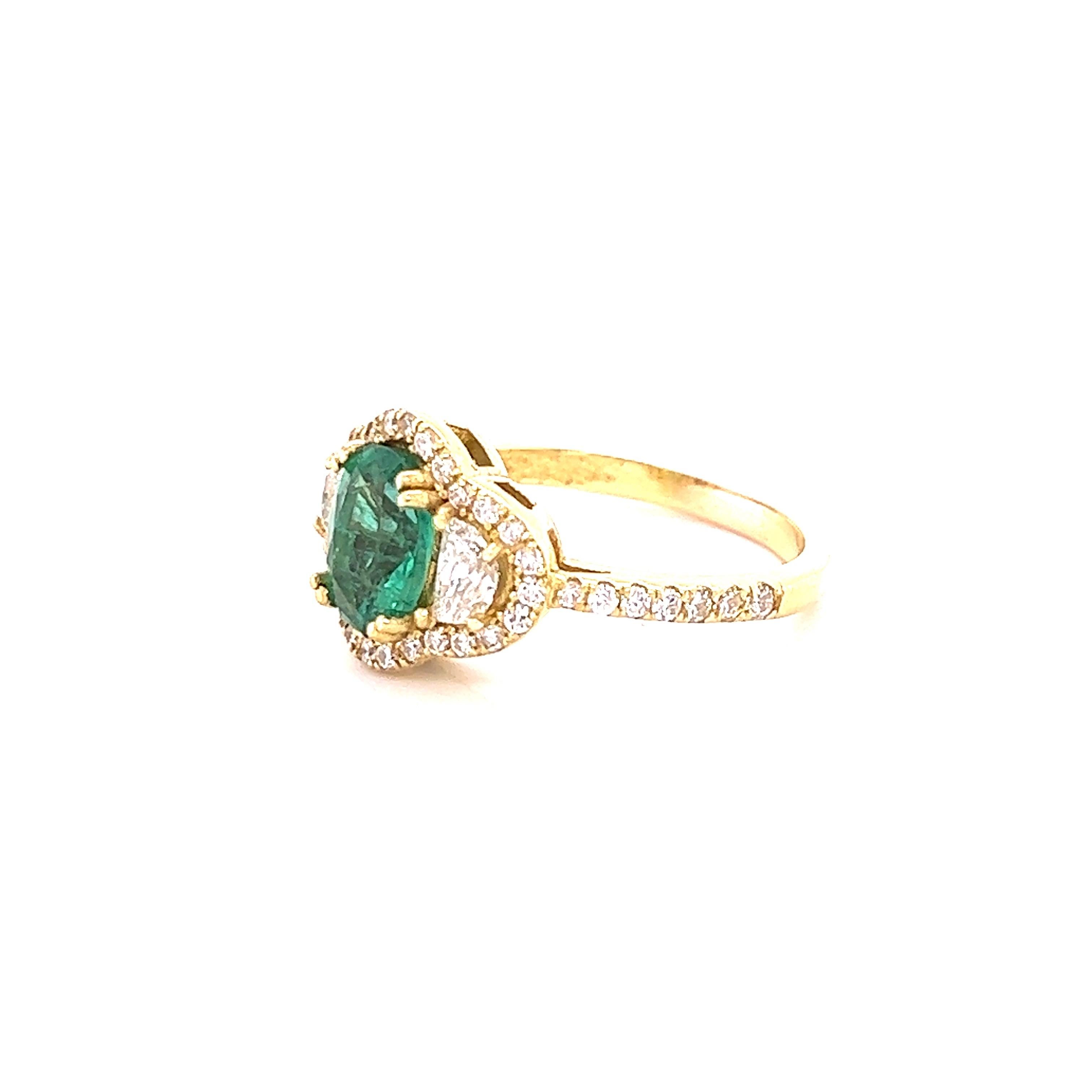 Oval Cut GIA Certified 2.45 Carat Emerald Diamond 18 Karat Yellow Gold Three Stone Ring For Sale