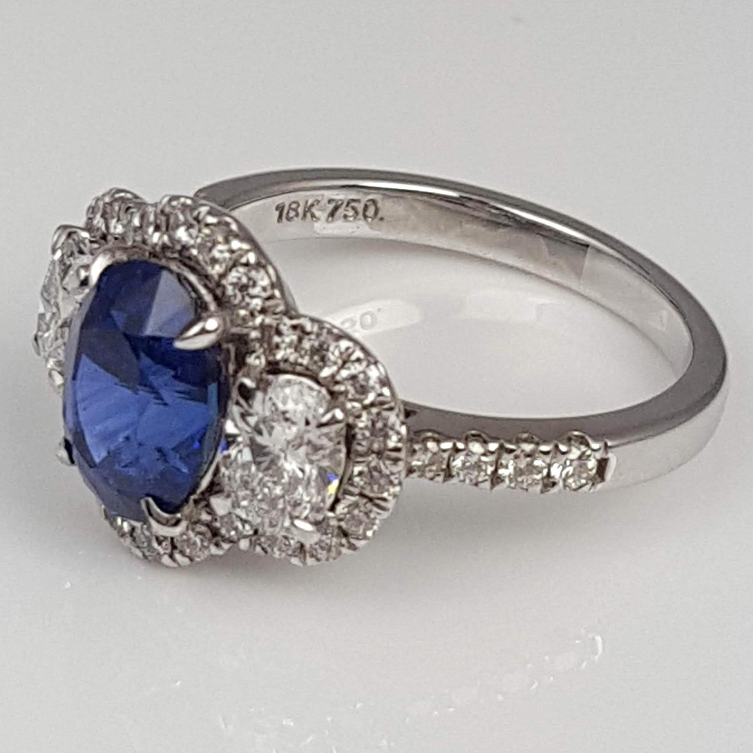 GIA Certified 2.45 Carat Oval Cut Ceylon Sapphire Ring by Diamond Town In New Condition In New York, NY