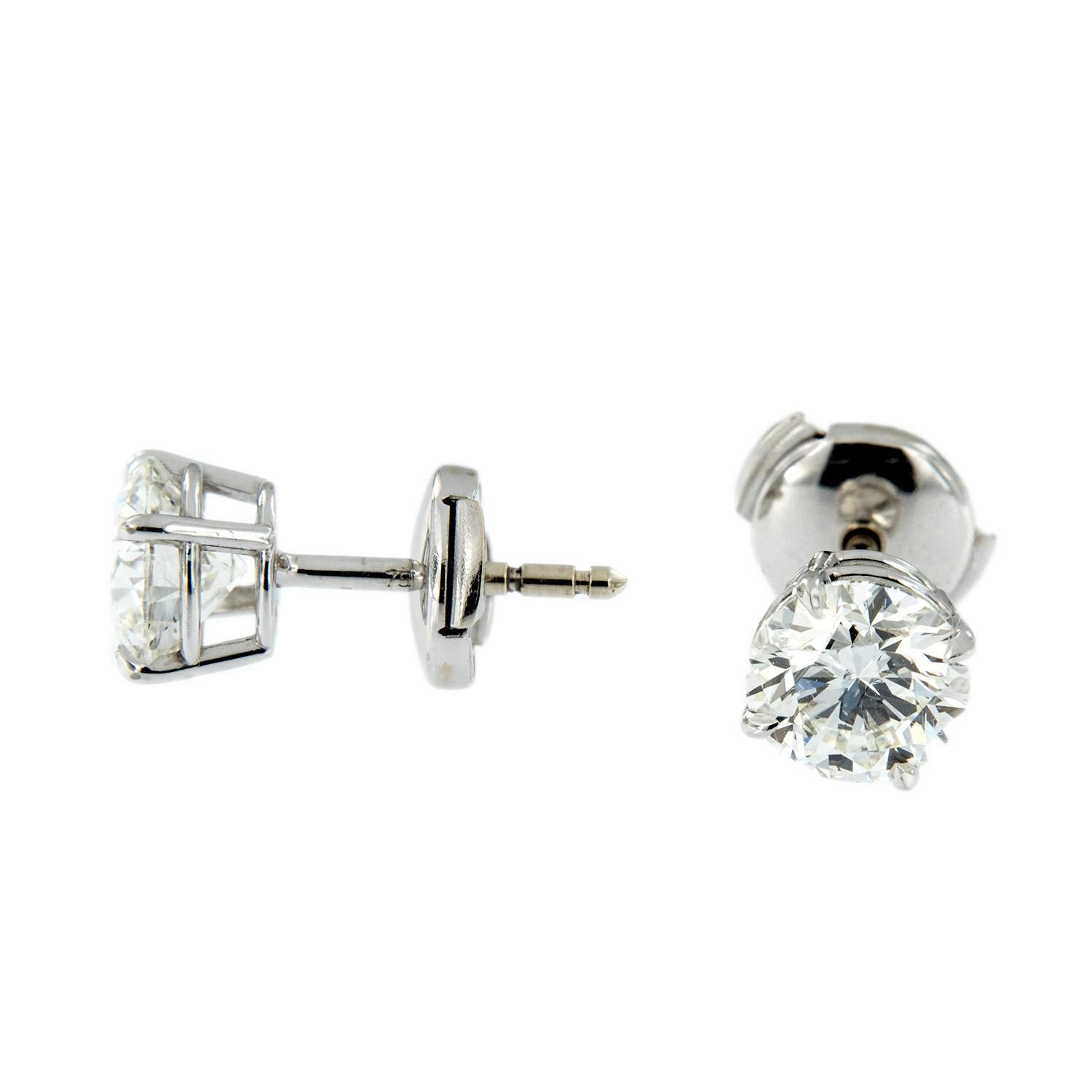 These beautiful earrings are crafted in enduring platinum. Each diamond is over 1 carat and in a four prong setting with locking Guardian backs for a  secure fit. Weigh 2.7 grams.

Diamonds 2.46 cttw
GIA #17178718. GIA #16845734