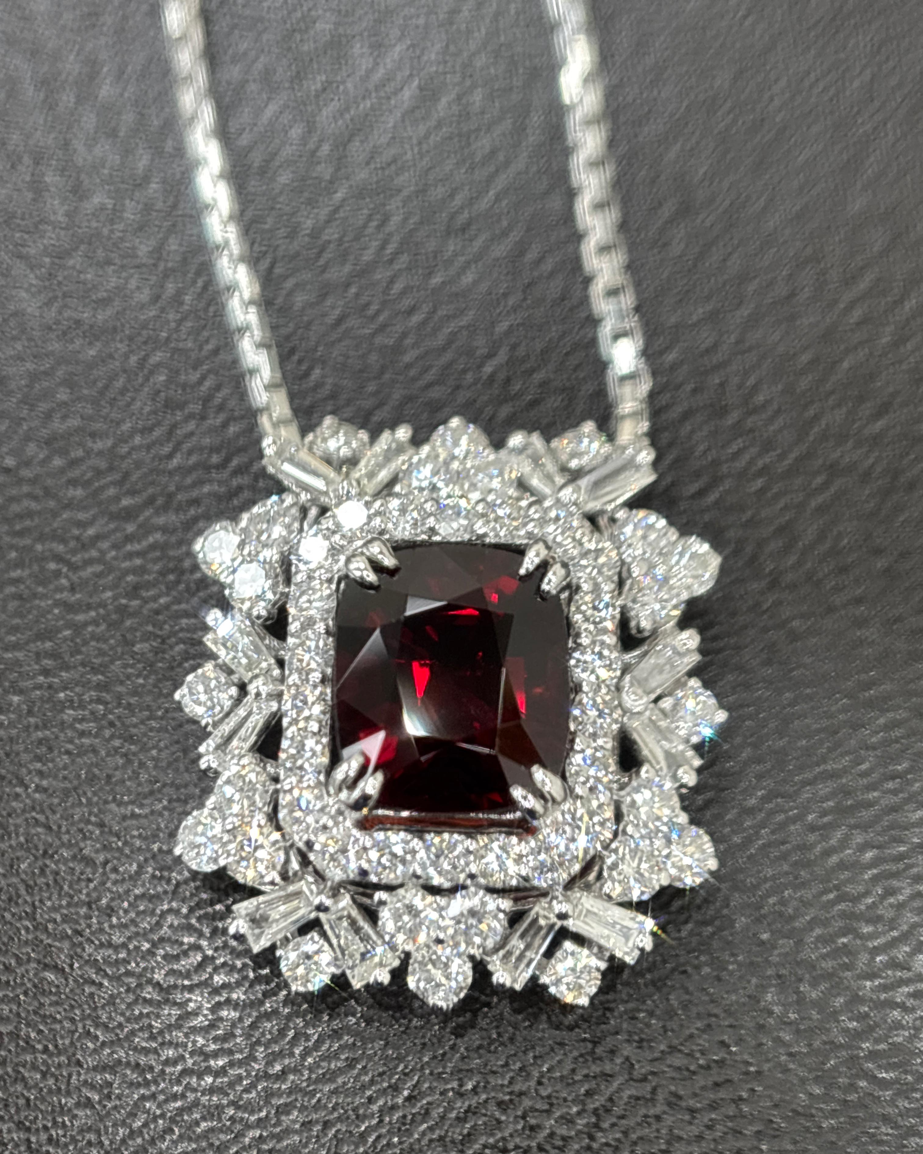 Exuding timeless elegance and exceptional rarity, this exquisite pendant features a GIA-certified 2.47 carat natural red spinel from Mogok, Burma—renowned for producing the world’s most coveted spinels. Untreated and unheated, this fine cushion-cut