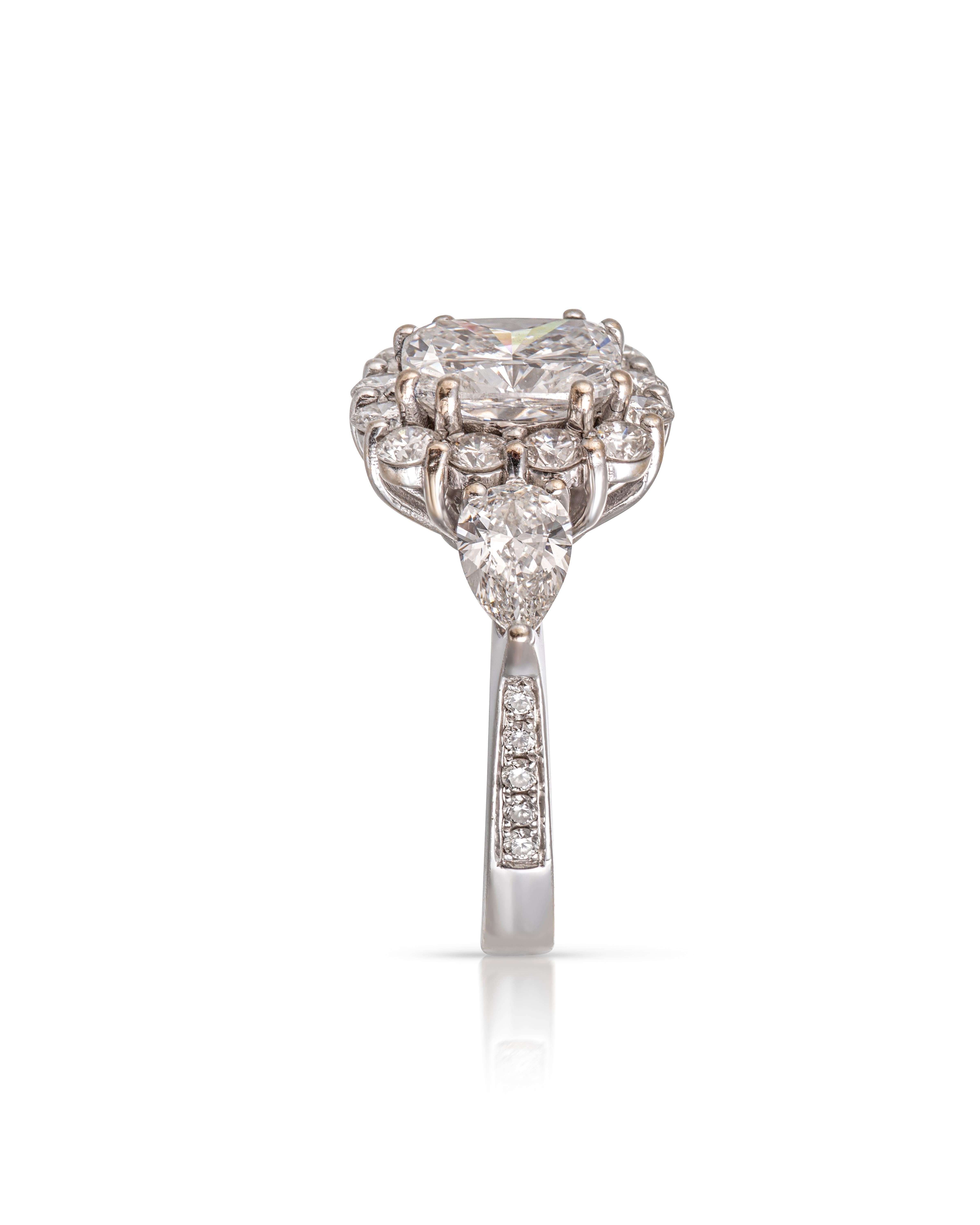 GIA Certified 2.5 carat D Colour and Internally Flawless Cushion Cut Diamond ring
A gorgeous Gia Certified 2.5ct D colour and Internally flawless cushion shaped diamond. The main diamond is set within a diamond cluster setting which is further