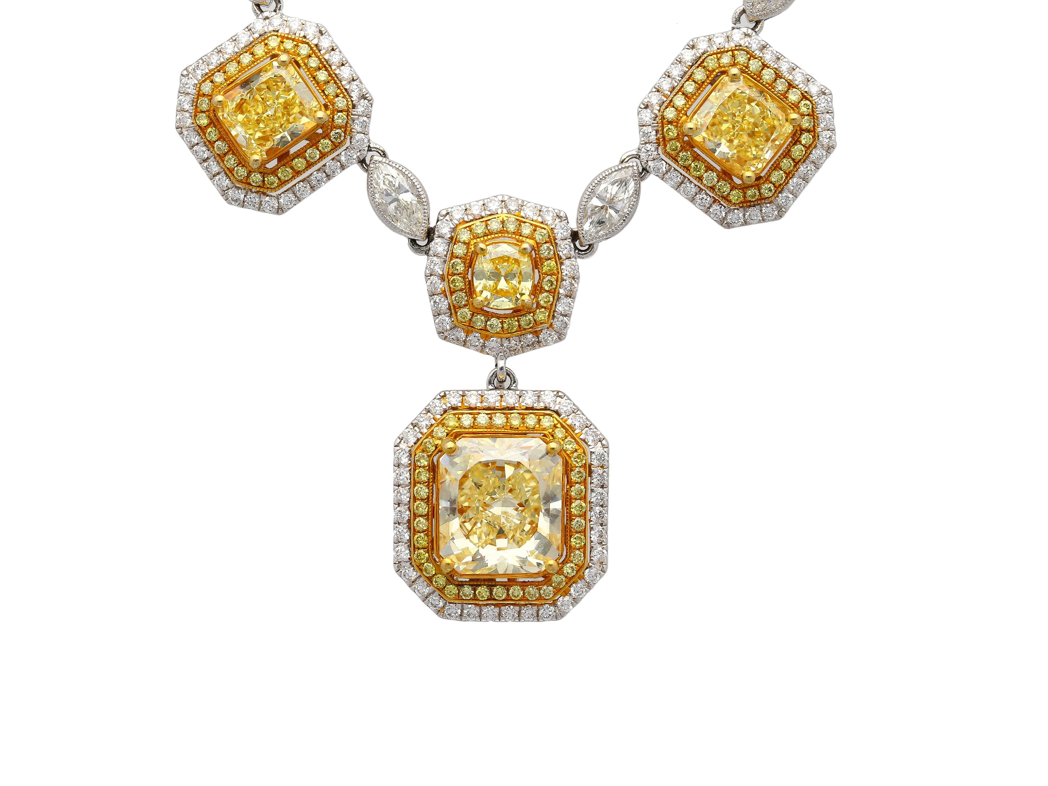 Introducing a masterpiece in luxury and fine jewelry. A 25-carat total Fancy Yellow and White Diamond charm style necklace in 18k solid gold. Each charm features a white and yellow diamond double halo, separated by round and marquise cut bezel