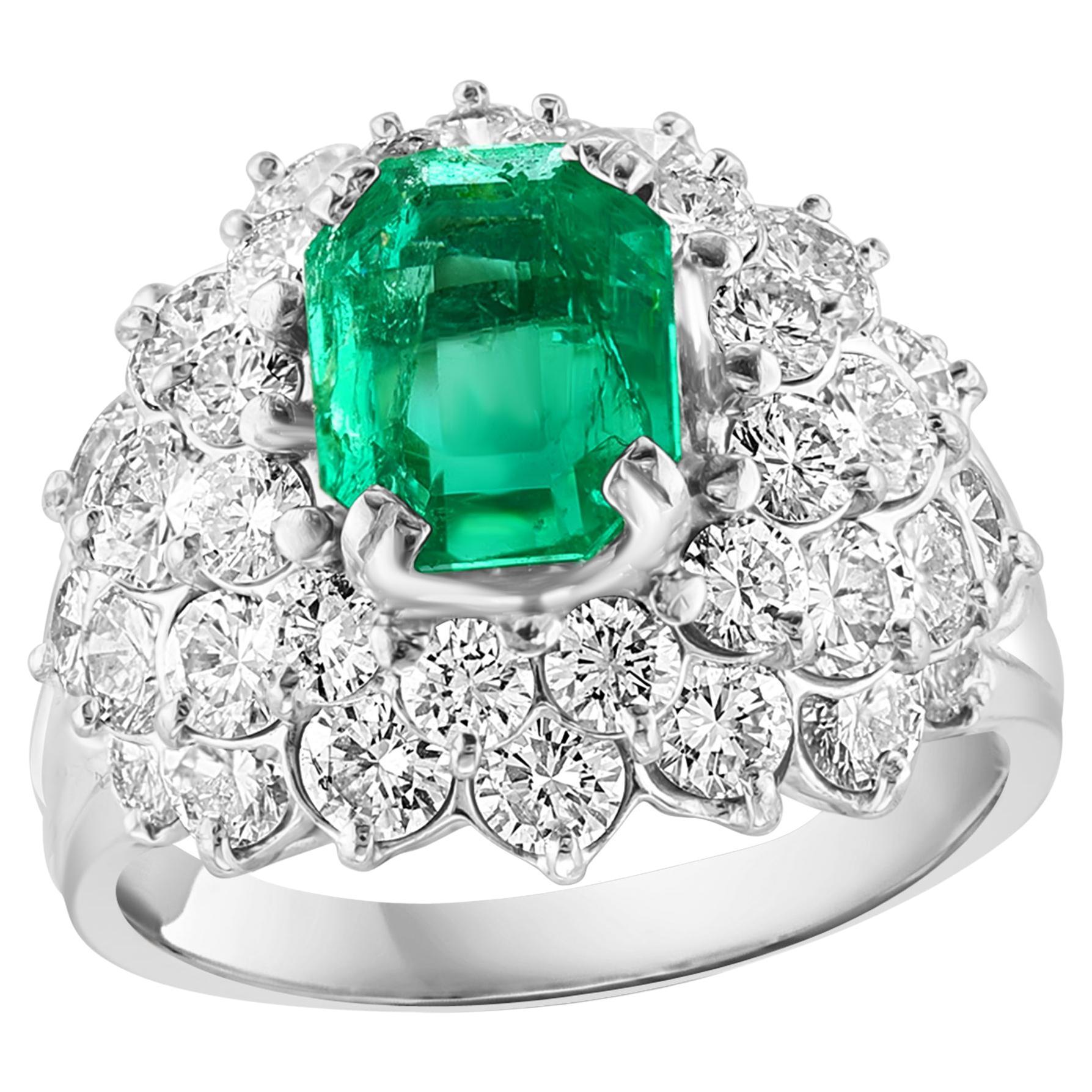 A classic, Unisex ring
Approximately 2.5  Ct Emerald Cut Colombian Emerald 
GIA certified , F2 
 Diamonds: 40 Pieces , approximate 4 Carat 
Platinum 12.8 gm
Emerald: 2.5 Carat 
GIA certificate report 1226741084
Natural Beryl , Colombian , F2
Origin