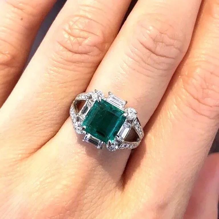 GIA Certified Colombian Emerald and Diamond Ring in Platinum

Colombian Emerald and Diamond Ring features a 2.50 Carat Square Emerald cut Emerald accented by Baguette and Round Diamonds set in Platinum.

Emerald weighs 2.50 carats and is GIA