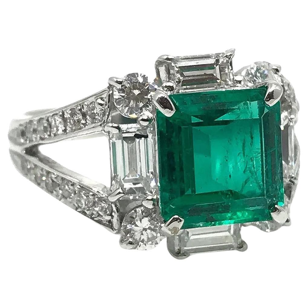 GIA Certified 2.50 carat Colombian Emerald and Diamond Ring in Platinum For Sale