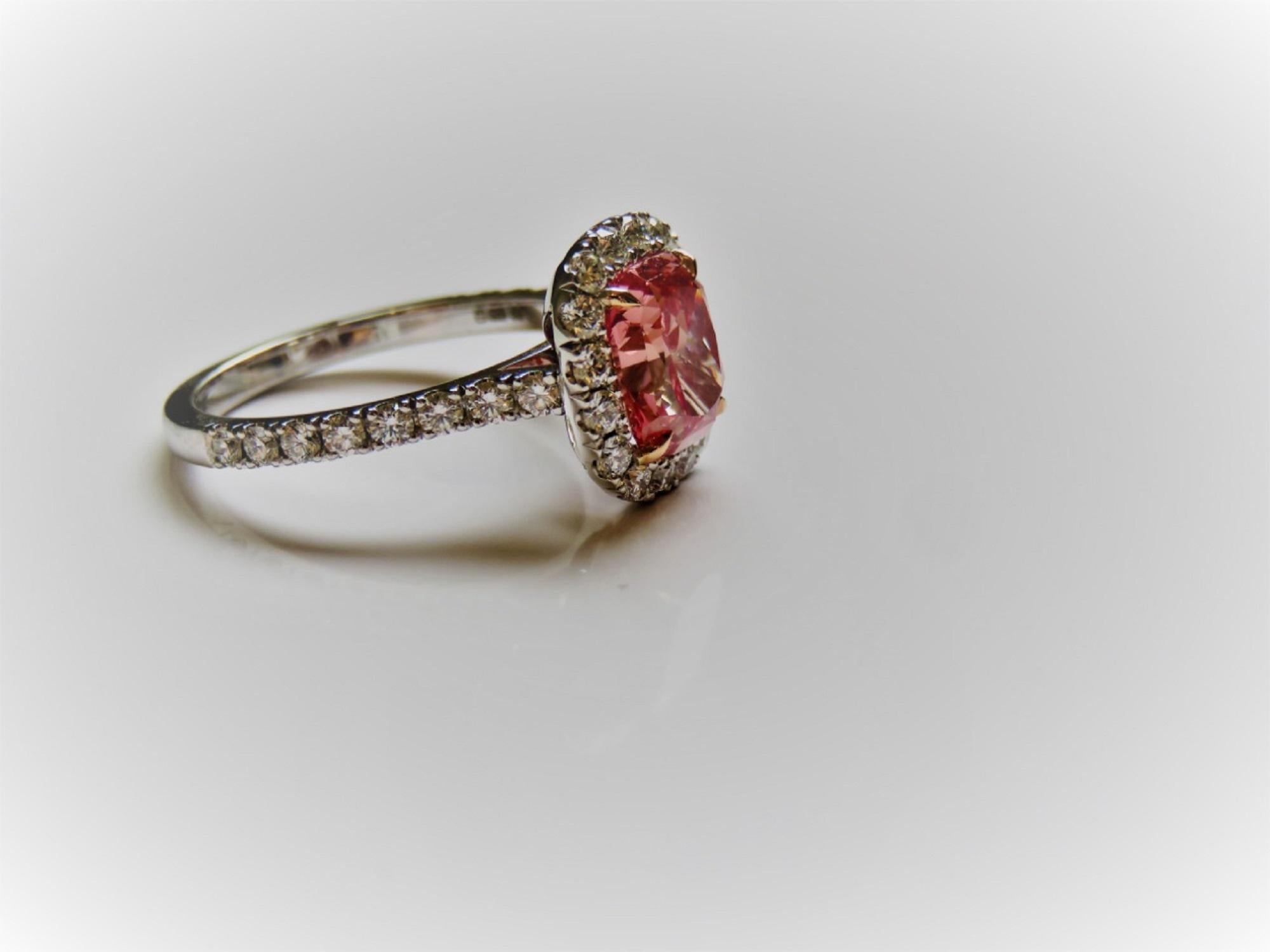 Modern GIA Certified 2 Carat Fancy Vivid Orangy Pink Cushion Diamond Halo Ring