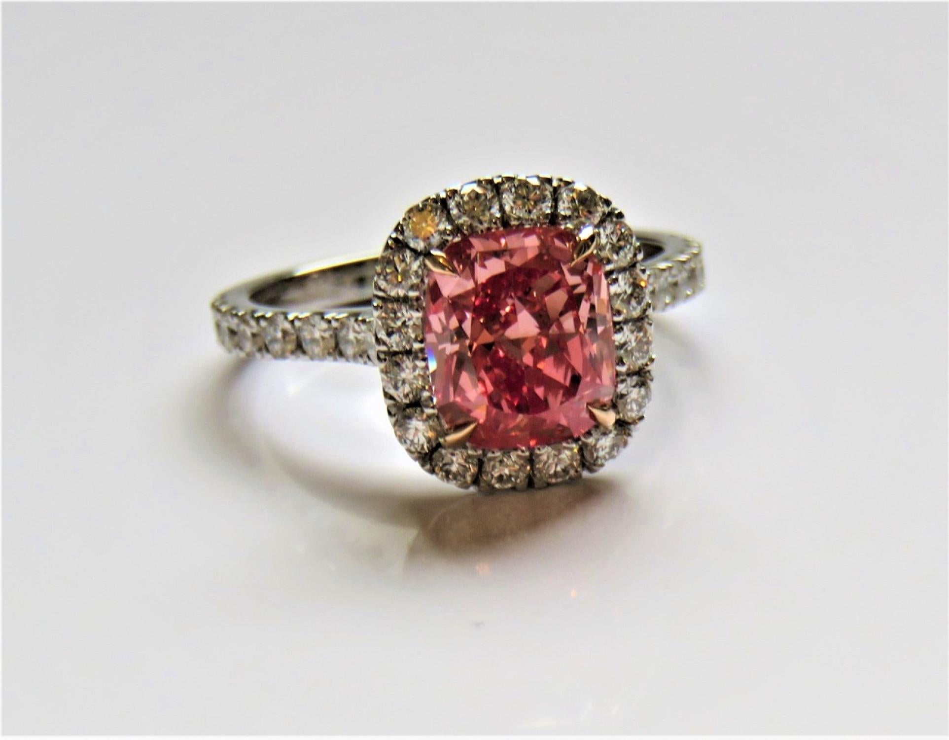 GIA Certified 2 Carat Fancy Vivid Orangy Pink Cushion Diamond Halo Ring In New Condition In Rome, IT