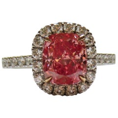 GIA Certified 2 Carat Fancy Vivid Orangy Pink Cushion Diamond Halo Ring