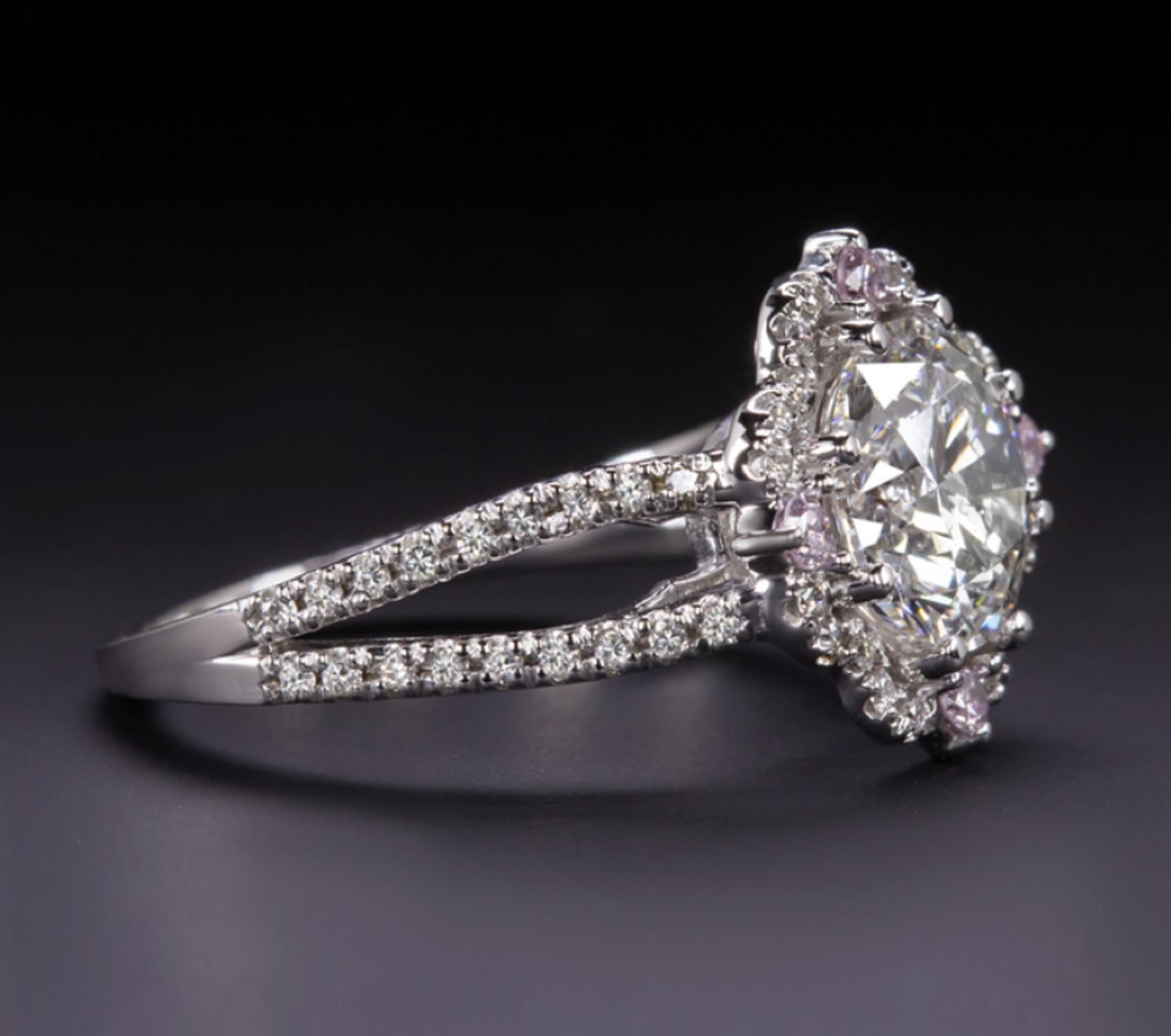 Amazing diamond solitaire ring
100% Eye clean white diamond
GIA Certified 
pink diamond setting