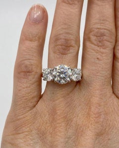 GIA Certified 2.50 Carat Round Brilliant Diamond Platinum Three-Stone Ring