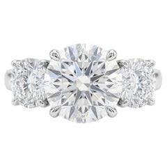 GIA Certified 2.50 Carat Round Brilliant Diamond Platinum Three-Stone Ring