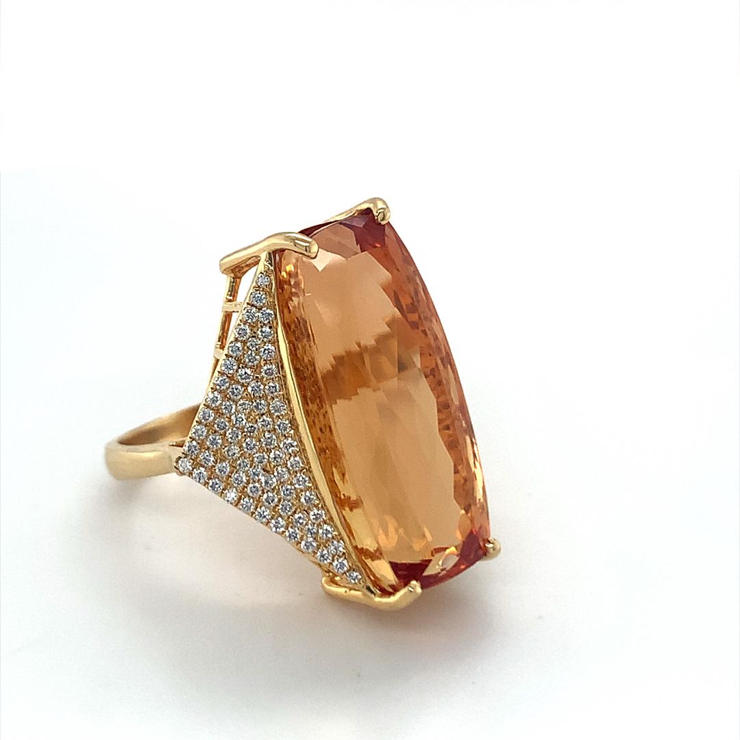 25.01 Carat Cushion Imperial Topaz with Diamond set in 18 Kt yellow gold
