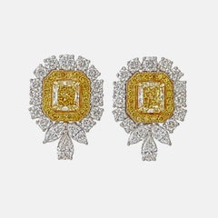 GIA Certified 2.51 Carat Fancy Intense Yellow Diamond In 18 Karat White Gold