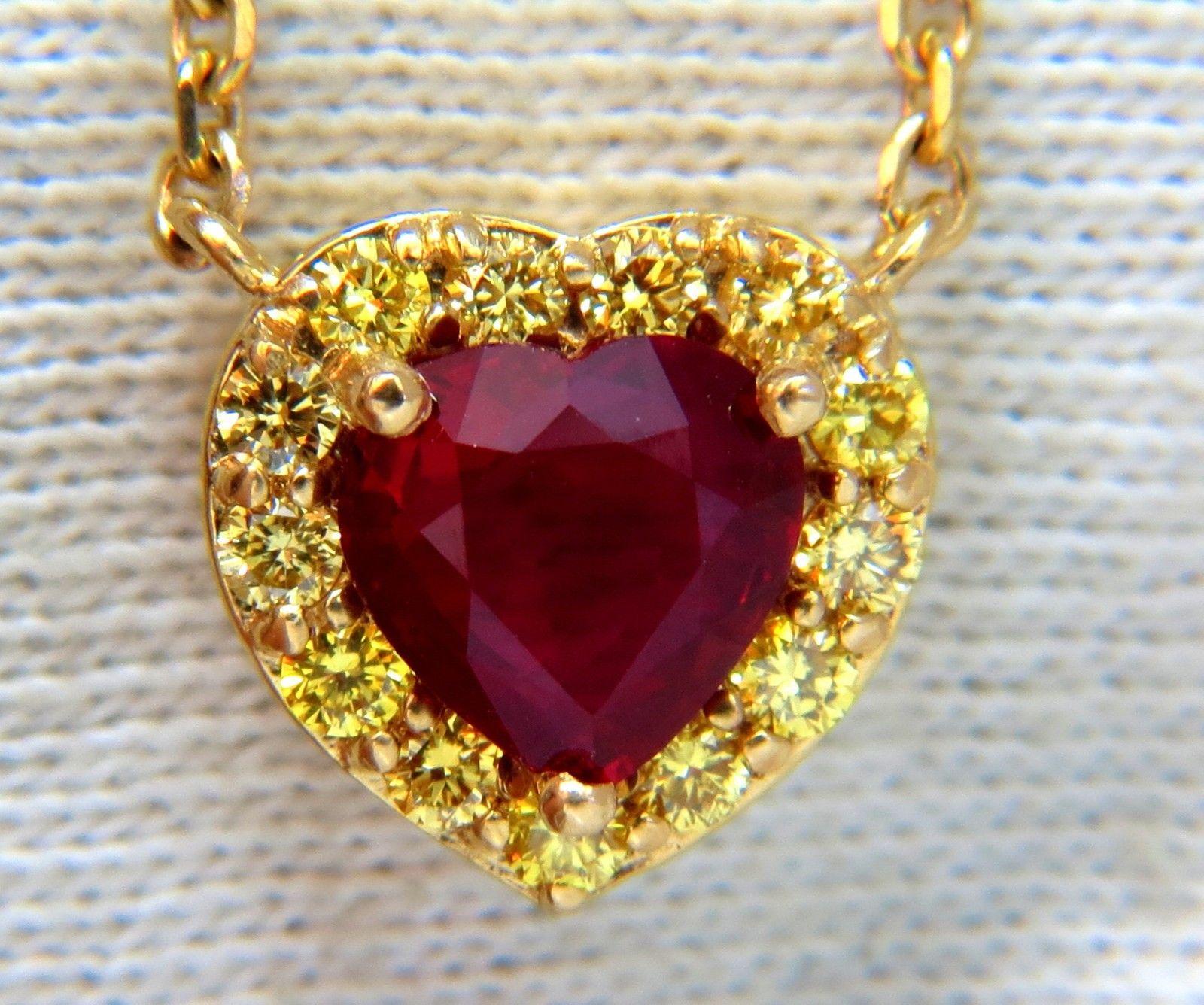 1.66ct GIA Certified Ruby Necklace

Report # 1176094721

Clean Clarity & Transparent

Heart cut

Vivid Red.



.85ct Natural Round diamonds

Vs-2 clarity

Fancy Yellow colors.

Overall:

11.4 X 11.9mm

Necklace measures 17.75 inches long

18kt.