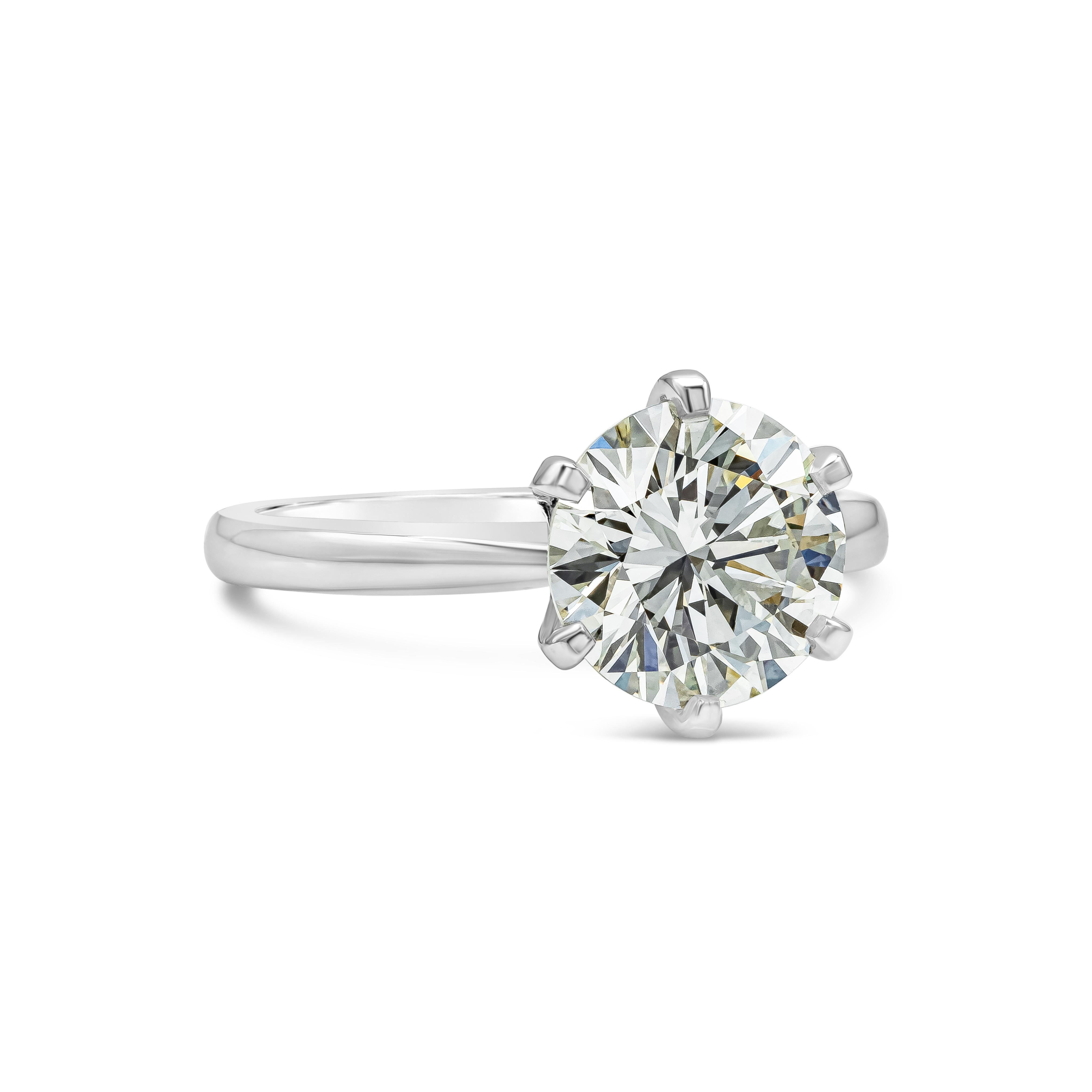 A classic engagement ring style showcasing a 2.51 carats round brilliant diamond certified by GIA as K color and VS1 in clarity, set in a traditional solitaire style mounting and made in 14k white gold. 

Roman Malakov is a custom house,