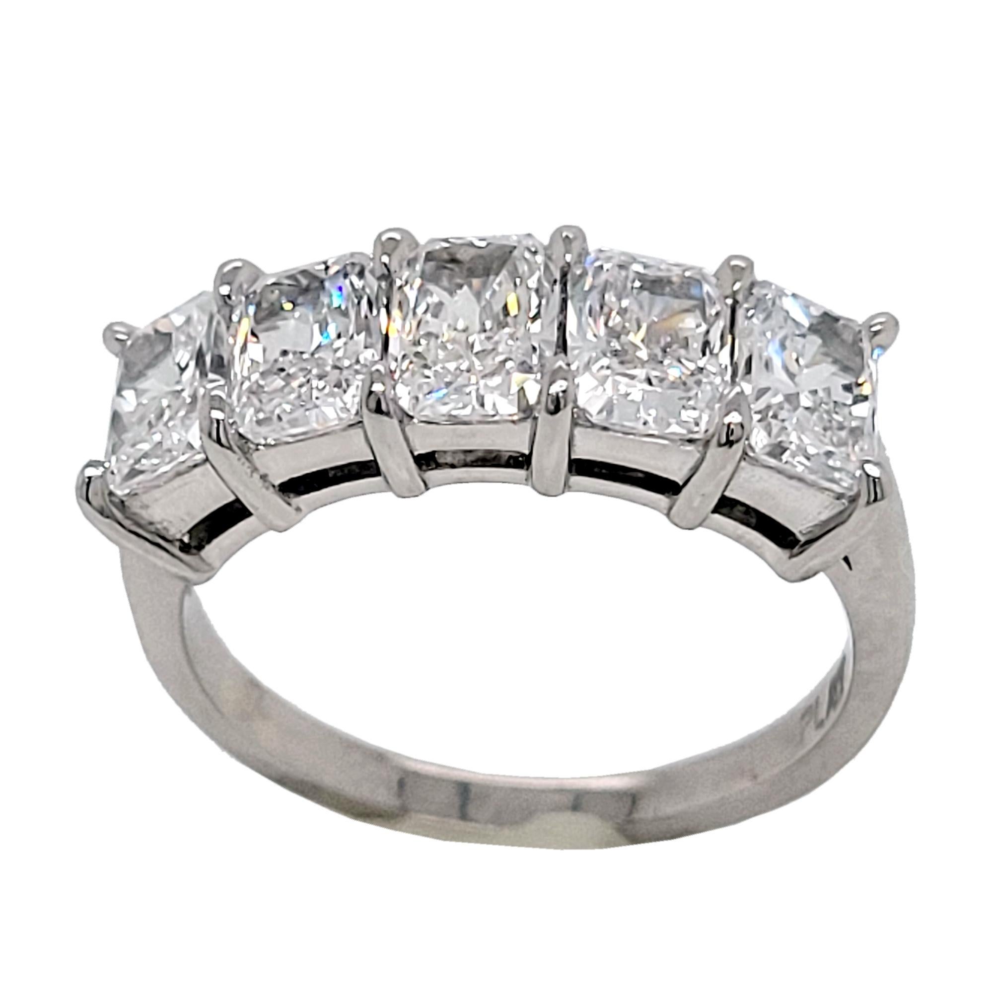 This beautiful Anniversary Ring is made in Platinum showcasing 5 perfectly matched GIA Certified  (VS1-VS2/D-F)  0.50 Ct Radiant Diamonds Set in Shared Prong Mode.
2 diamonds are D Color, 2 are W Color and 1 is F Color
4 diamonds is VS1  Clarity 