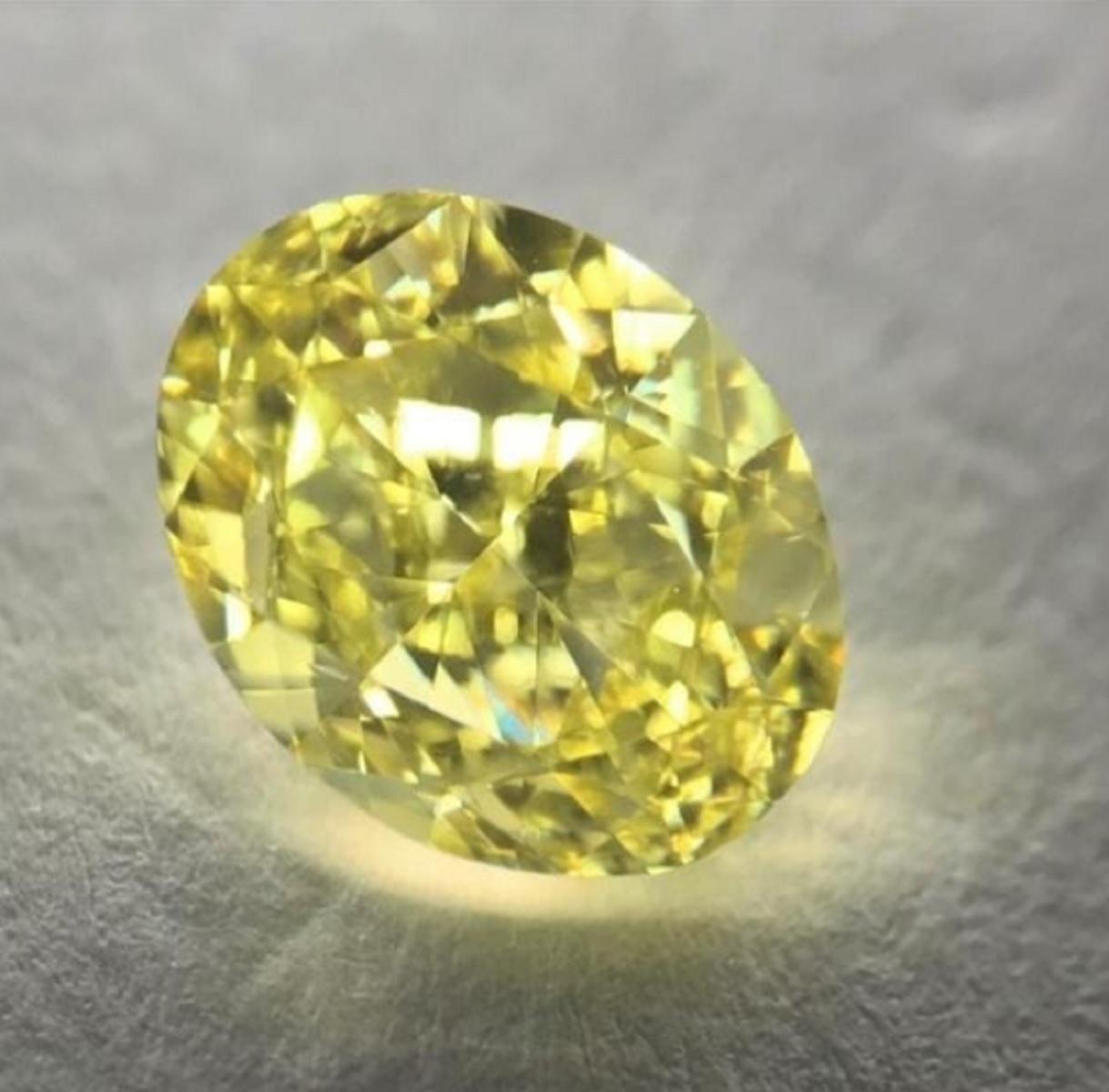 GIA Certified 2.50 Carat Fancy Yellow Oval Diamond Ring