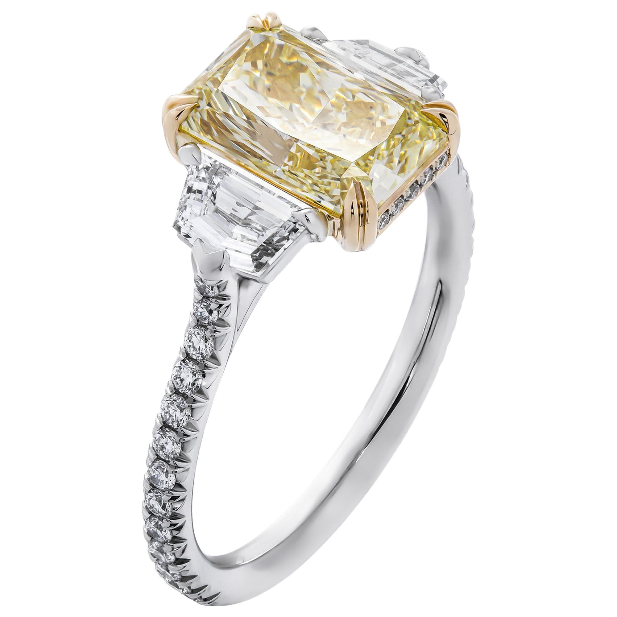 Mounted in handmade custom design setting featuring Platinum 950 & 18K Yellow Gold, diamonds on the shank and on a basket under each stone, a true piece of art

Setting features exceptional pave work, delicate yet sturdy, includes approximately