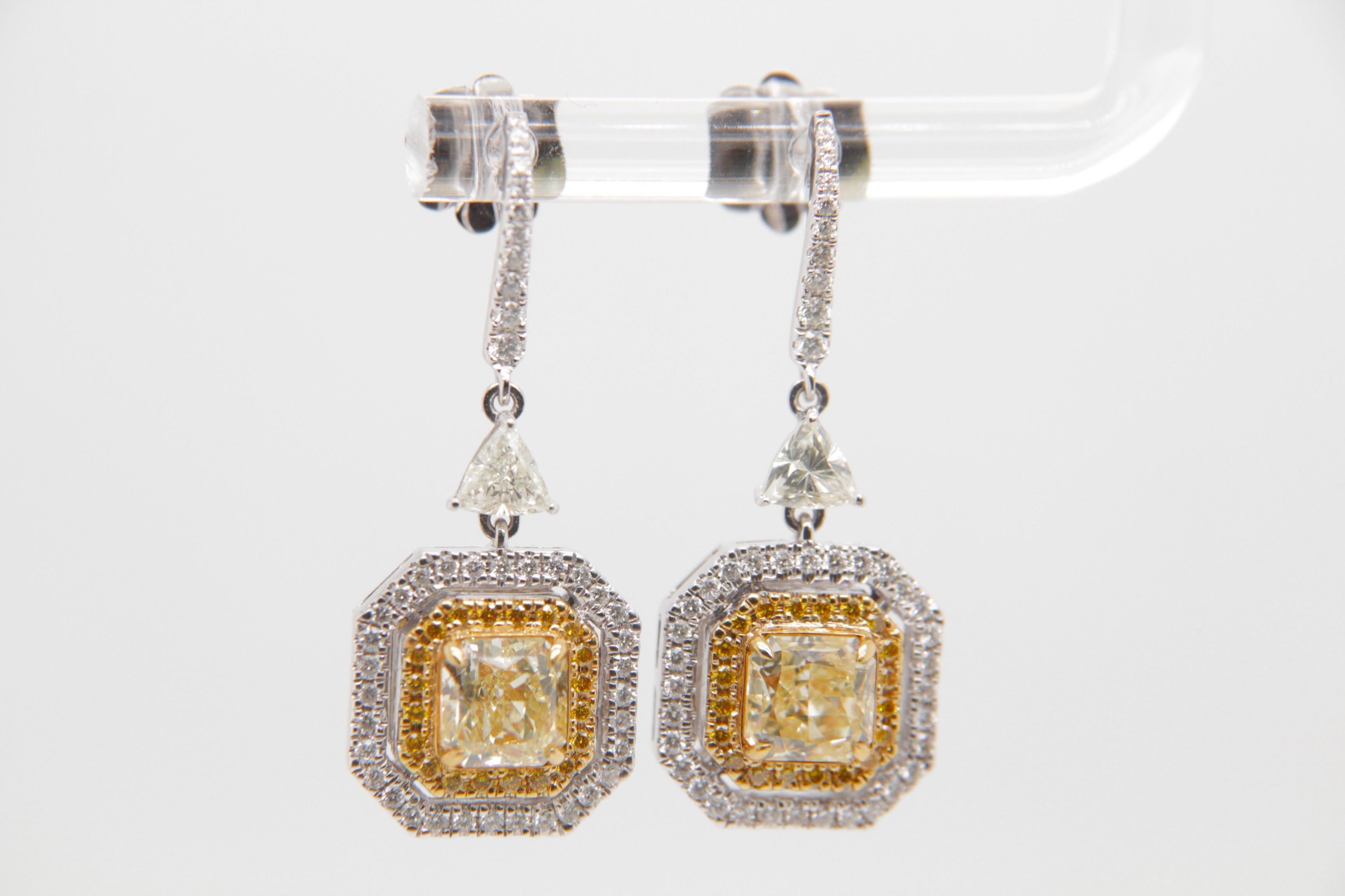 Introducing a captivating creation from Rewa Jewelry, these diamond earrings are a mesmerizing expression of timeless elegance and refined craftsmanship.

At the heart of these earrings are two radiant diamonds, totaling 2.53 carats. Each diamond,