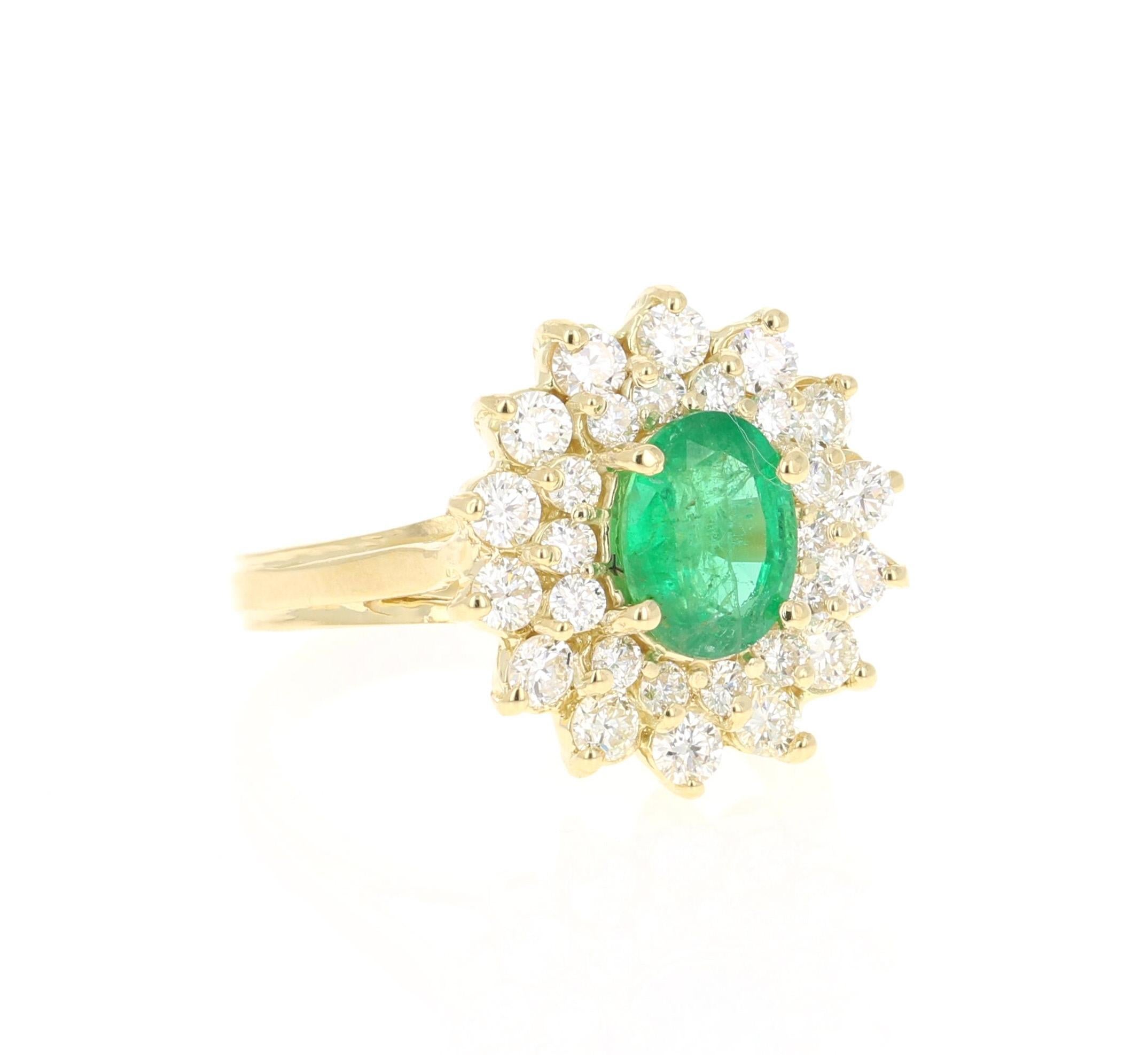 A beautiful 2.54 Carat Emerald and Diamond Ring in 18K Yellow Gold.
This gorgeous ring has a 1.39 Carat Oval Cut Emerald that is set in the center of the ring!  The Emerald is surrounded by 28 Round Cut Diamonds that weigh 1.15 carats. The Clarity