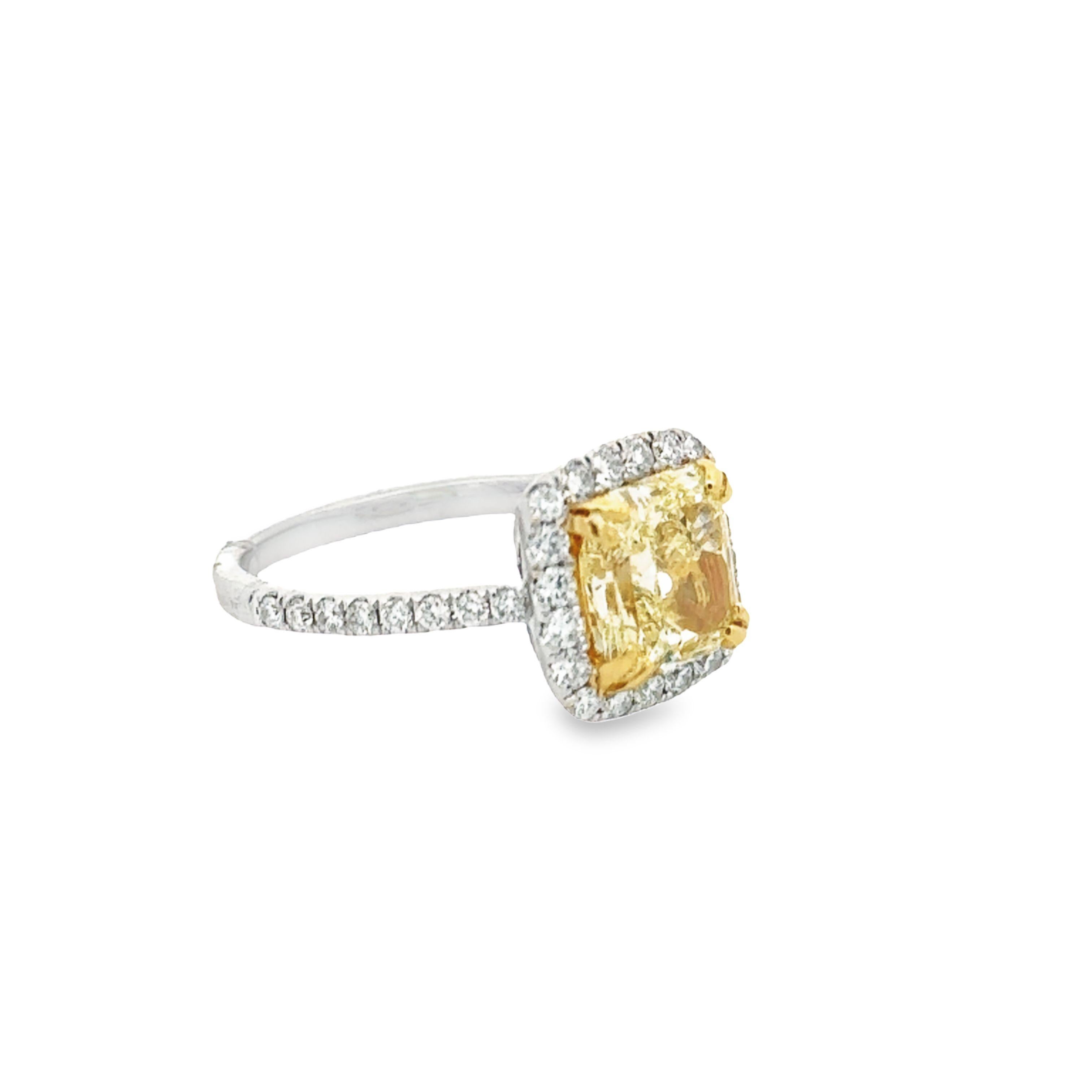 Introducing a radiant marvel that embodies the epitome of luxury and sophistication, behold this extraordinary 2.55-carat Fancy Light Yellow, VS1 Clarity, Radiant Cut Diamond Ring. Certified by GIA, this exceptional gem is exquisitely set into an