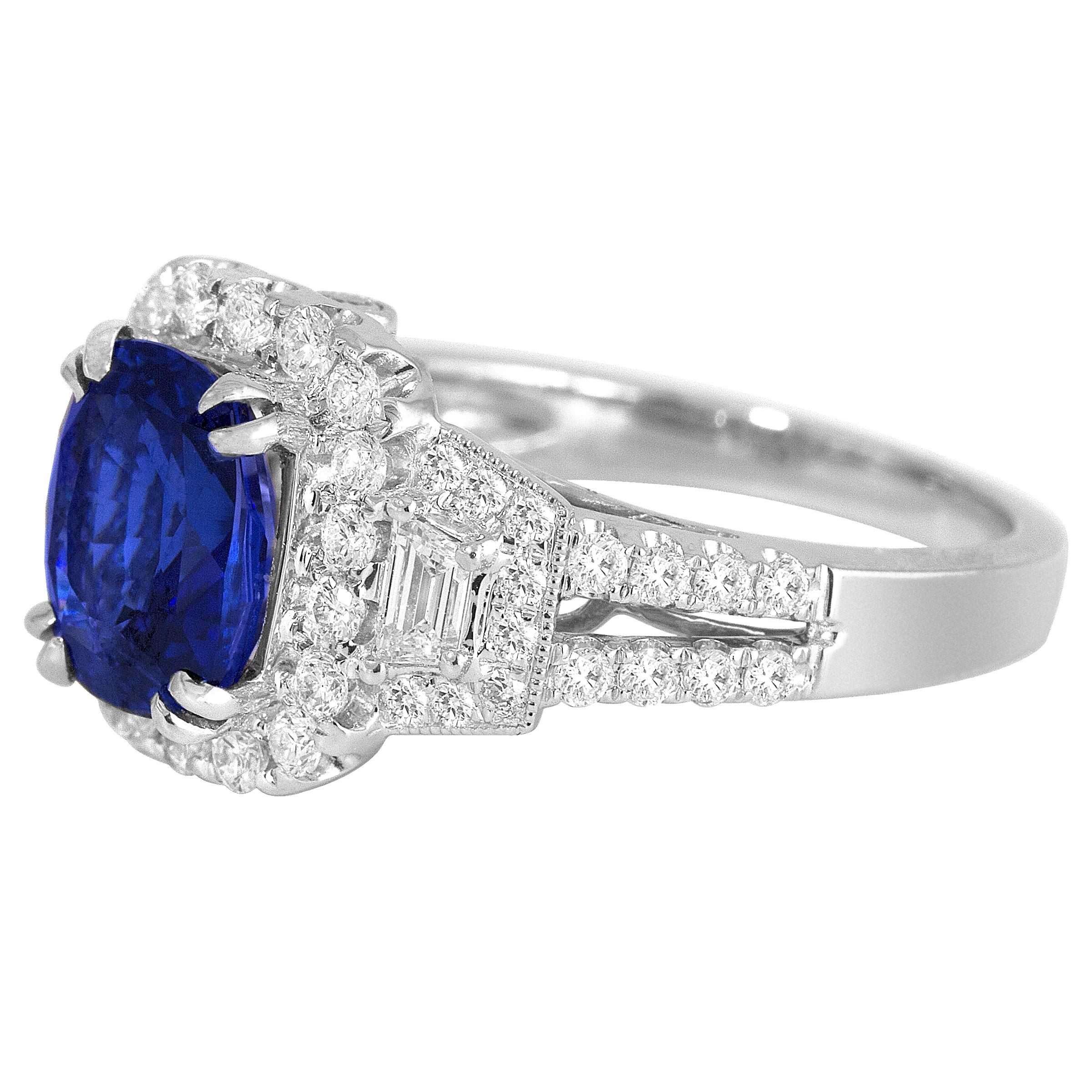 With a GIA Certified 2.56 carat cushion cut Ceylon sapphire center, and 0.87 carats white diamonds, this ring shines from every angle. Intricate hand engraved milgrain work throughout adds to the charm of the piece.

GIA Certification details (see