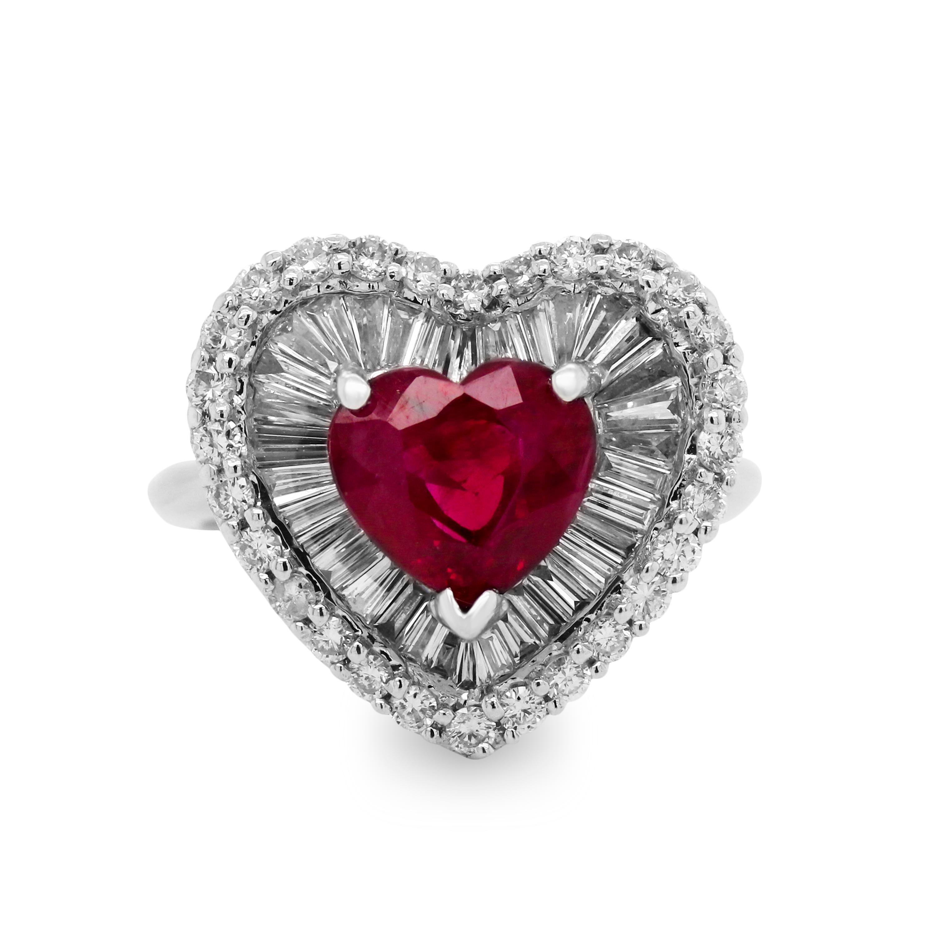 GIA Certified Heartshape 2.57 carat Natural Burma Ruby Diamond Platinum Ring

Center Heart Shape Ruby is Burma (Myanmar) origin. Ruby is said to be heat treated.

1.75 carat G color, VS clarity diamonds. Tapered Baguette and Round diamonds.

Size