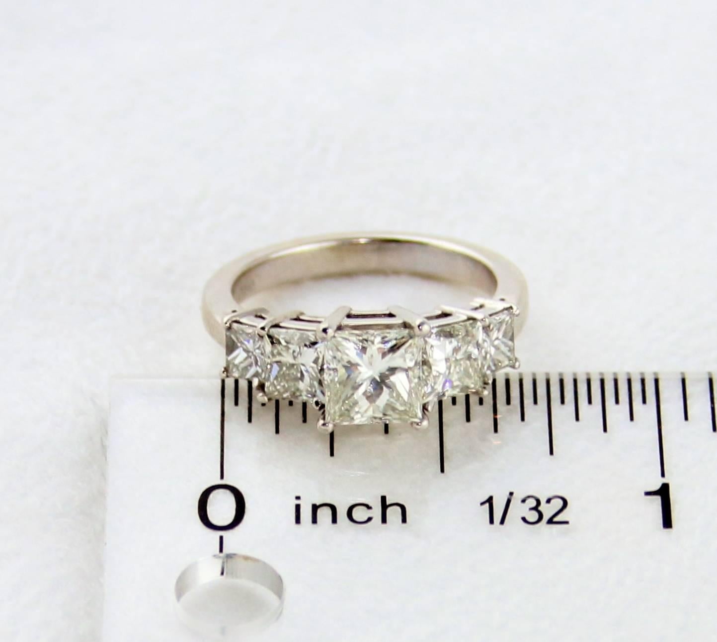 Contemporary GIA Certified 2.57 Carat Princess Cut Diamond Five-Stone Platinum Ring For Sale