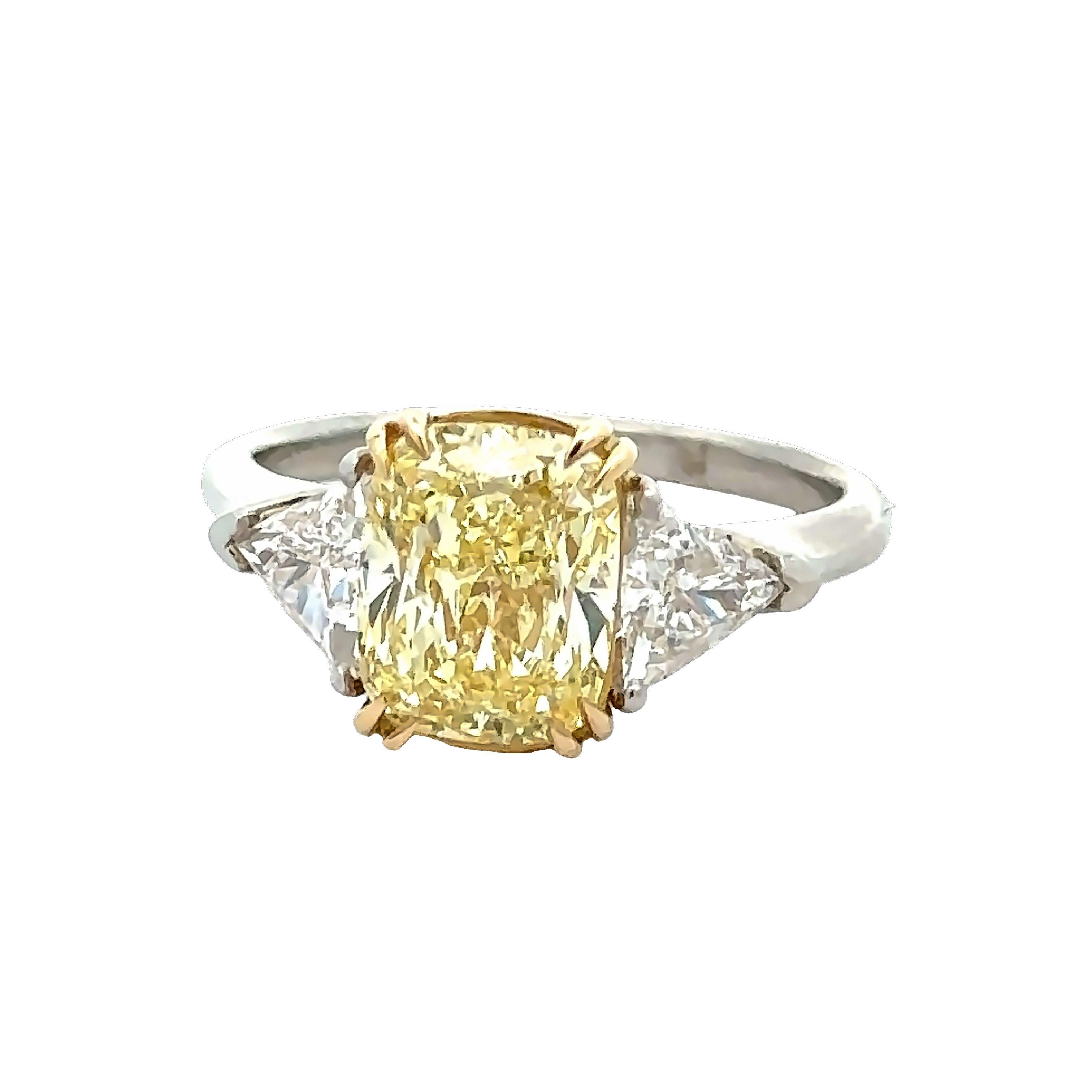 Women's GIA Certified 2.58 Carat Fancy Yellow Cushion Cut Diamond Ring For Sale