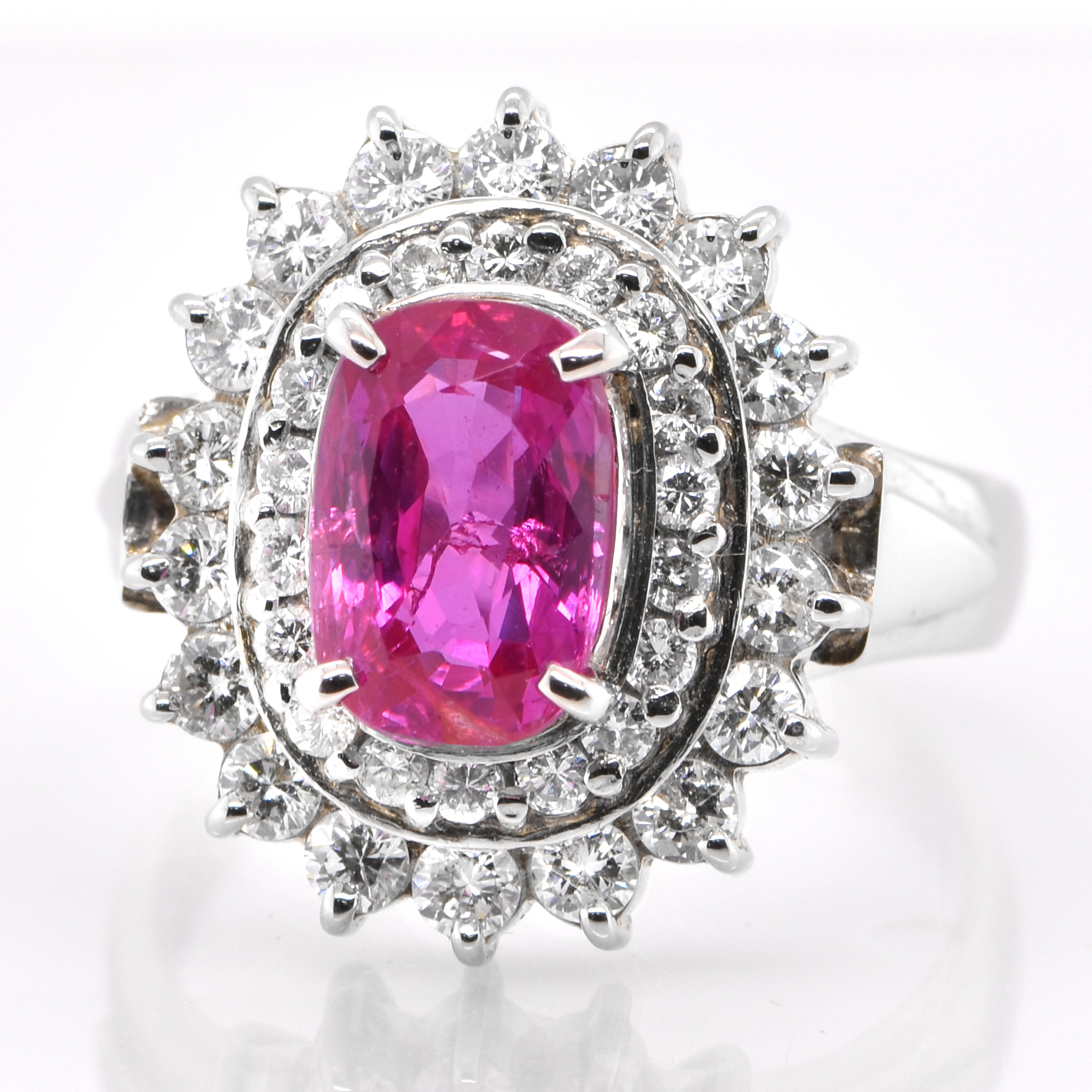 A beautiful ring set in Platinum featuring a GIA Certified 2.58 Carat Natural No Heat (Untreated) Ruby and 0.97 Carat Diamonds. Rubies are referred to as 