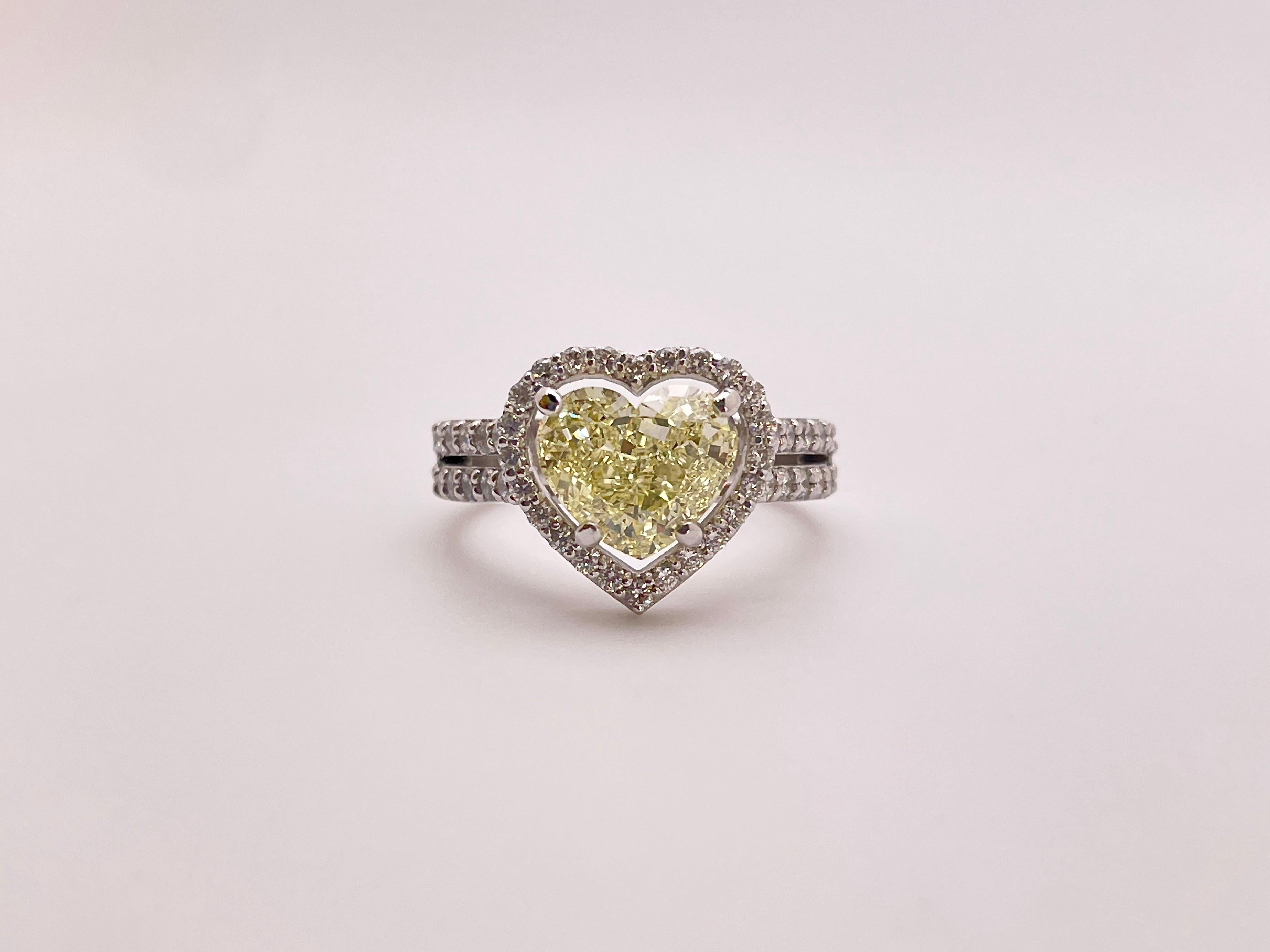 GIA Certified 2.61 Carat Natural Fancy Yellow Heart Diamond 18K Engagement Ring For Sale 7