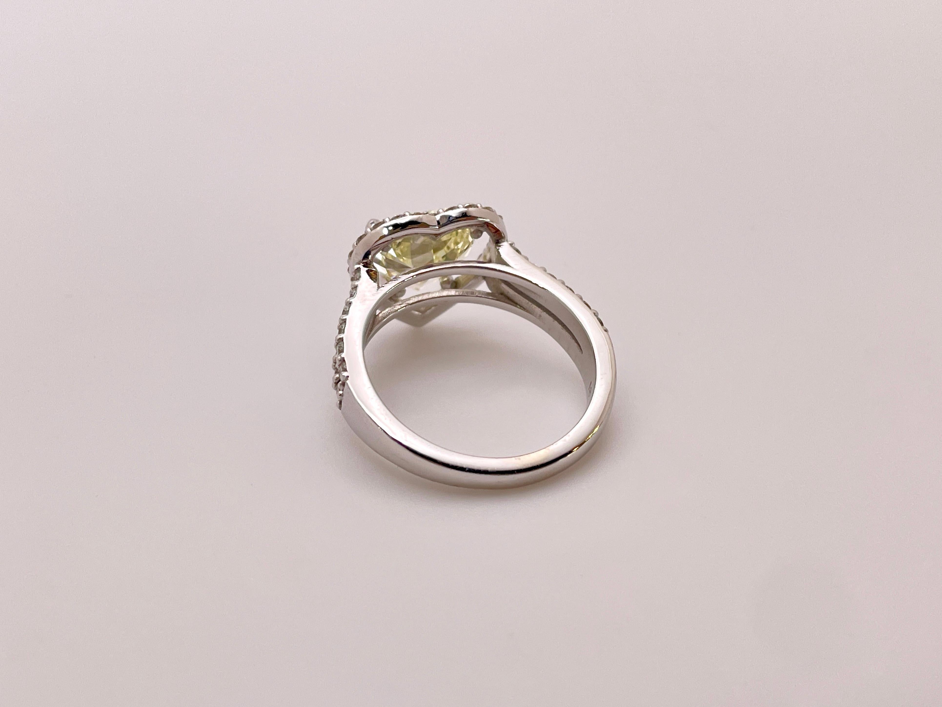 GIA Certified 2.61 Carat Natural Fancy Yellow Heart Diamond 18K Engagement Ring For Sale 3