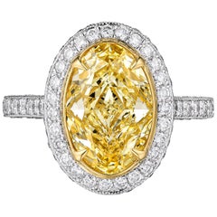 GIA Certified 2.61 Carat Fancy Yellow Oval Diamond Engagement Ring in Platinum