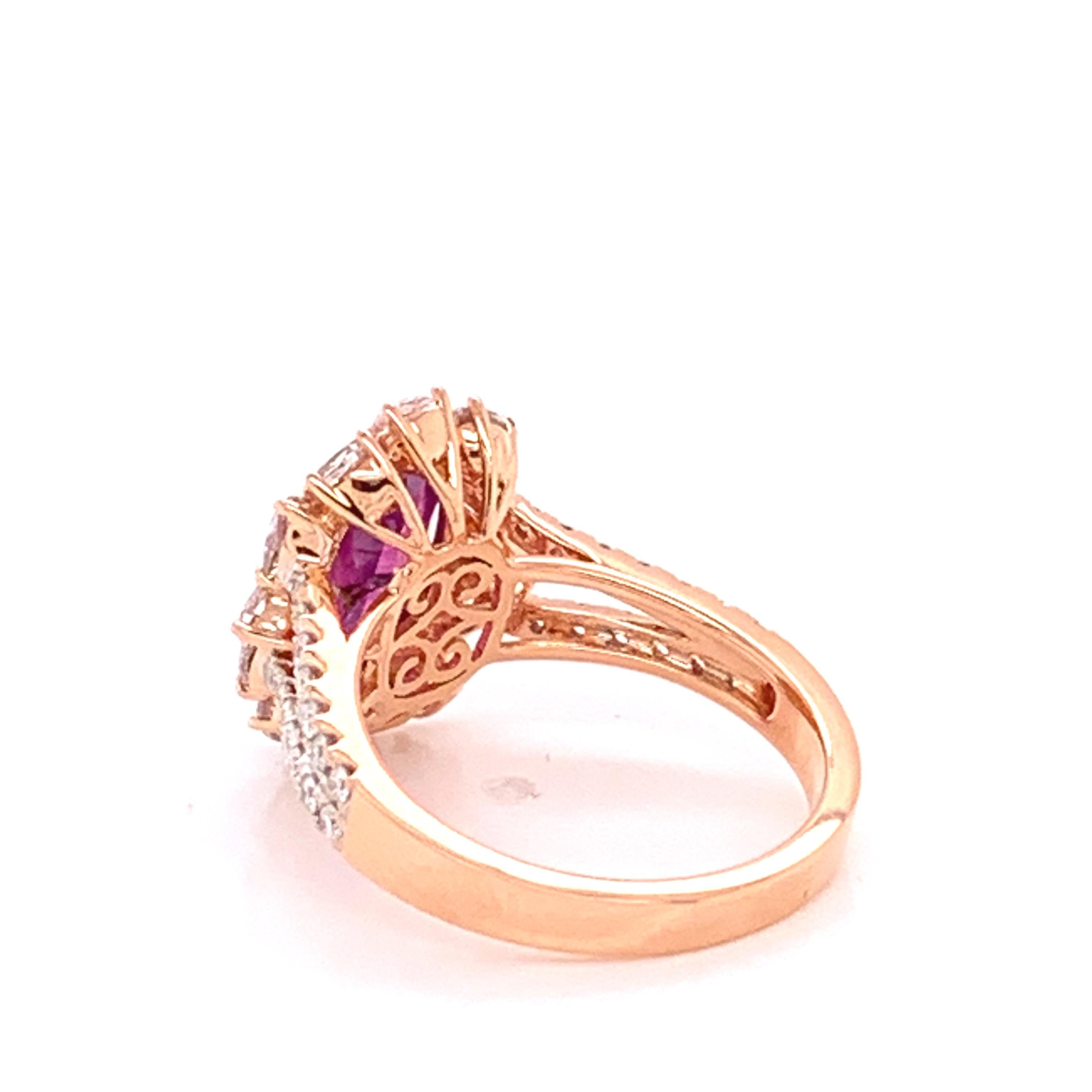 GIA certified 2.61 carat Purple Oval Kashmir Sapphire ,1.33 Carat Argyle Mine pink diamond and 0.36 carat white Round Diamond set in 18 Karat rose gold is one of a kind handcrafted Ring . The size of the ring is 7 and can be resized if needed. 
If