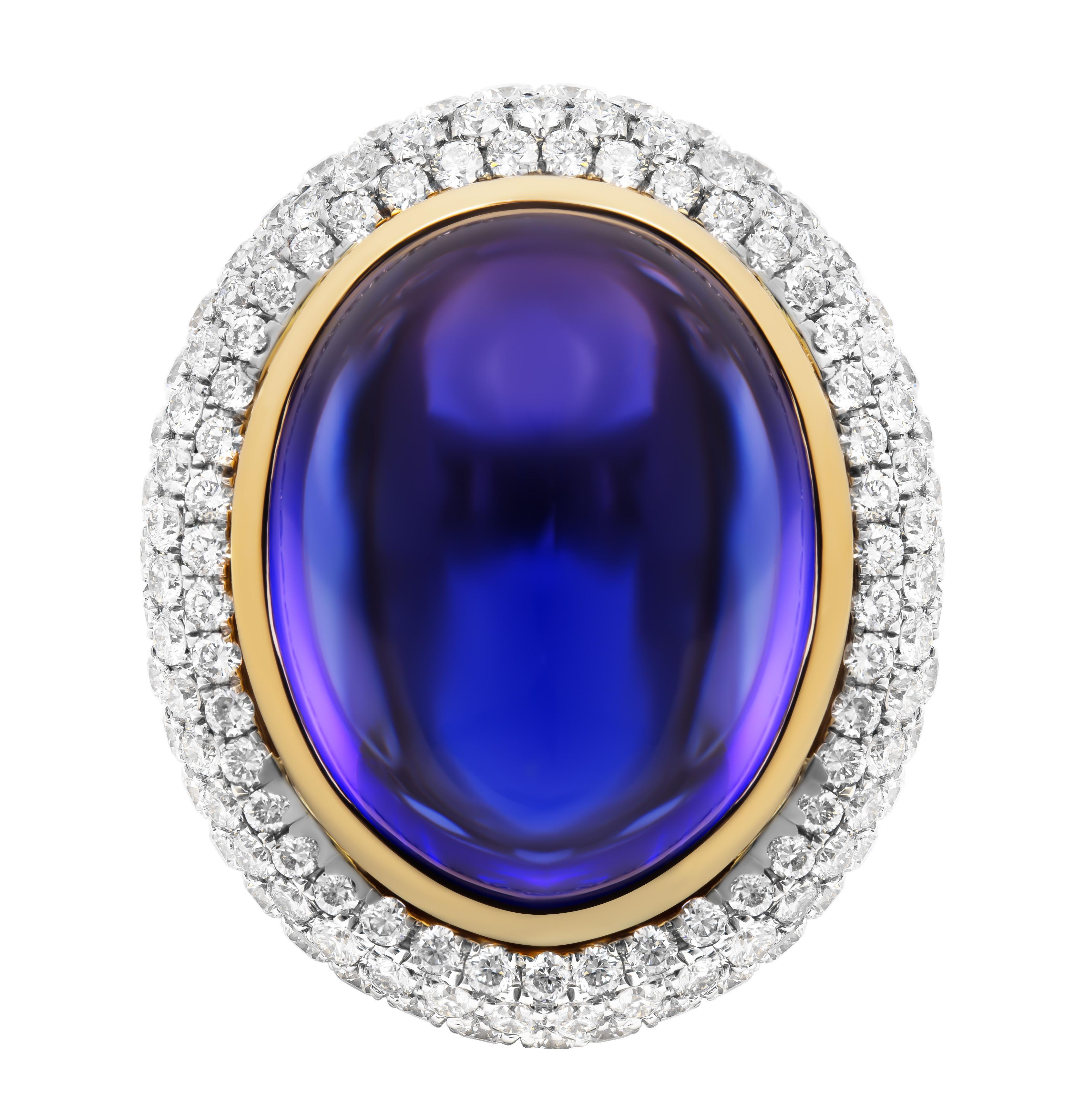 GIA Certified 26.37 Carat Oval Tanzanite Cabochon Diamond Cocktail Ring
Crafted in 18K White Gold & 18K Yellow Gold prongs

Size 6 (can be sized)

A Exceptional Handmade Statement piece, 18k White Gold High-Domed , 