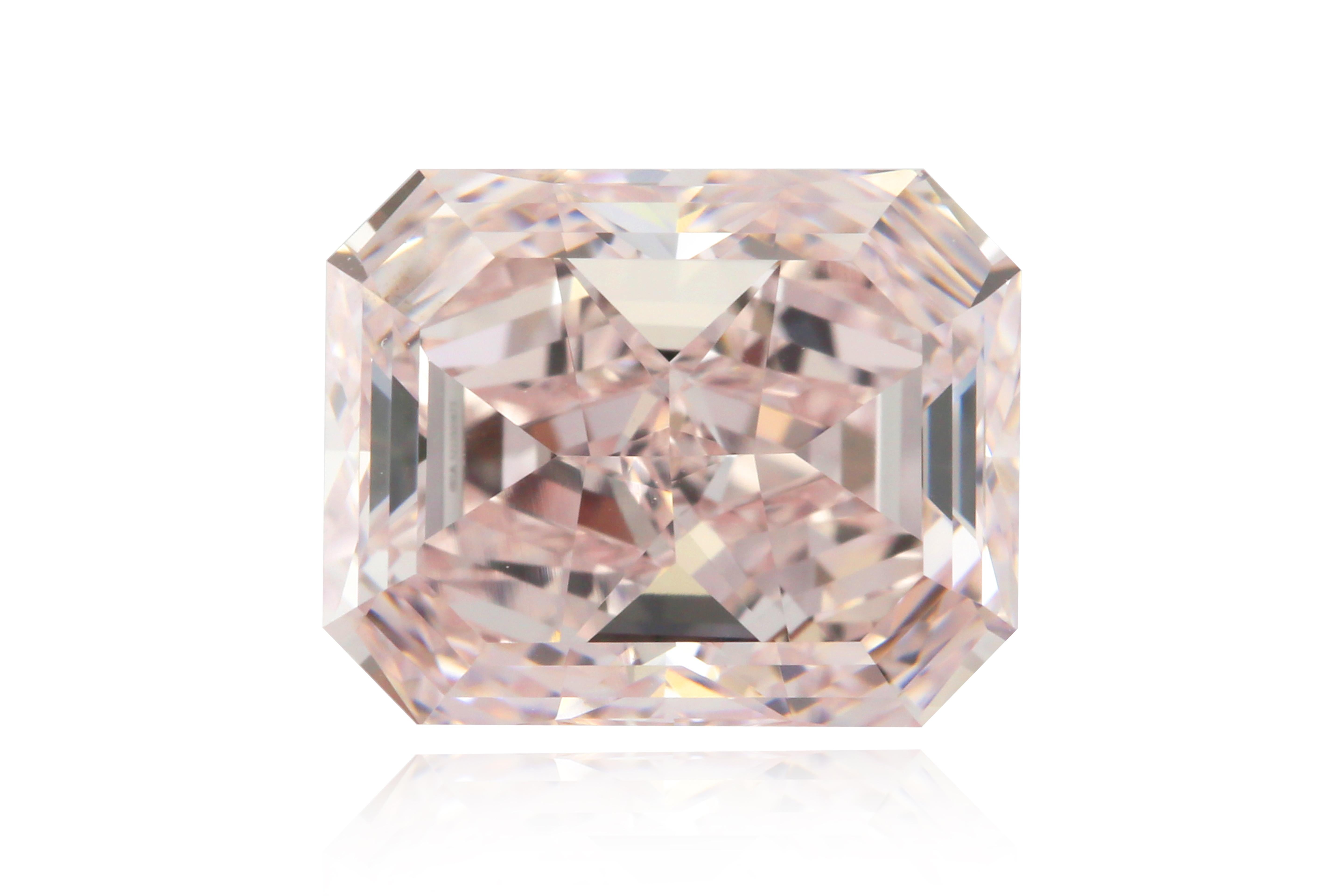 Indulge in the epitome of luxury with this breathtaking GIA Certified 2.64-carat Fancy Light Pink Radiant Cut Diamond. A masterpiece of nature, this diamond radiates a soft, romantic pink hue that exudes elegance and sophistication. The radiant cut
