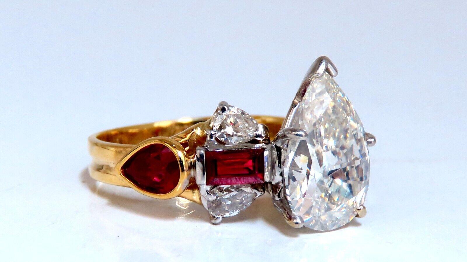 Three Stone Pears & Reds

2.64ct. Natural Pear diamond ring

GIA Certificate # 5221172632

J-color

 Si1 clarity

good Cut / Full cut Brilliant

Very Strong Blue Flouresence

1.50ct Side natural (4) Rubies

Vivid Deep Reds & Clean Clarity.

Baguette