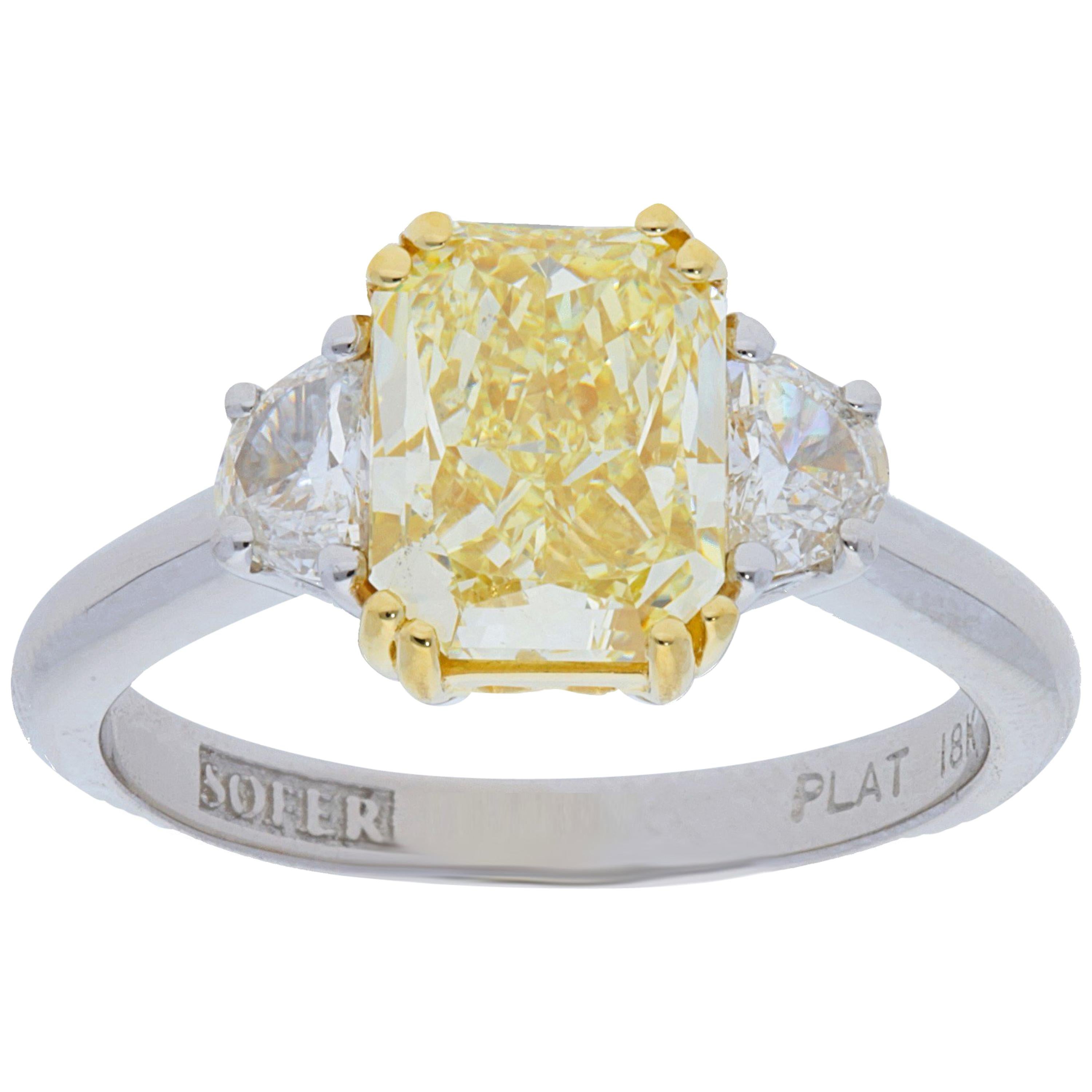 GIA Certified 2.67 Carat Fancy Yellow Radiant Diamond Three Stone Ring