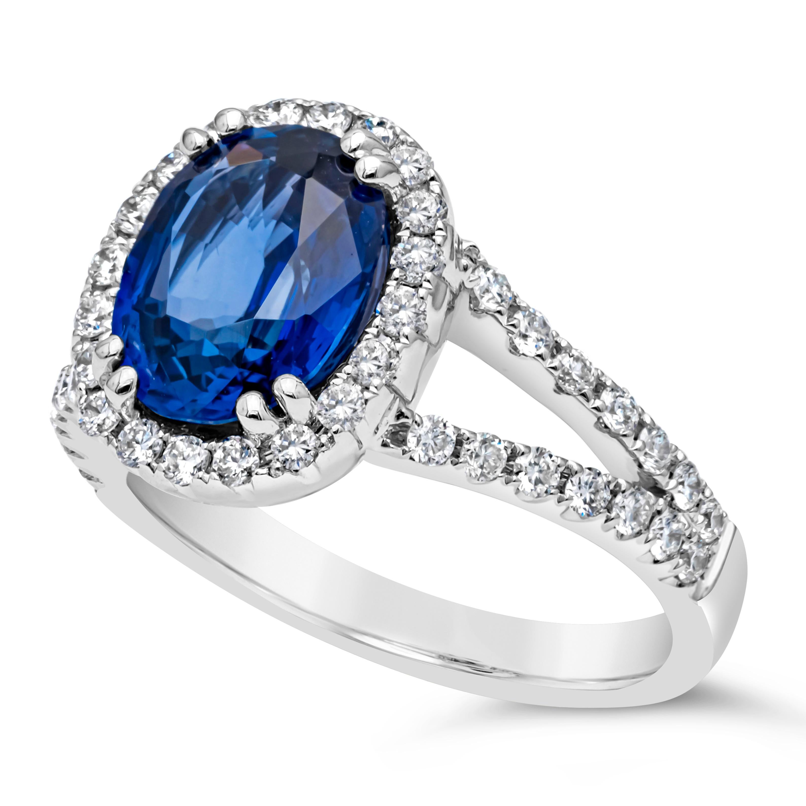 GIA Certified 2.68 Carat Oval Cut Heated Sri Lanka Sapphire Halo Engagement Ring In New Condition For Sale In New York, NY