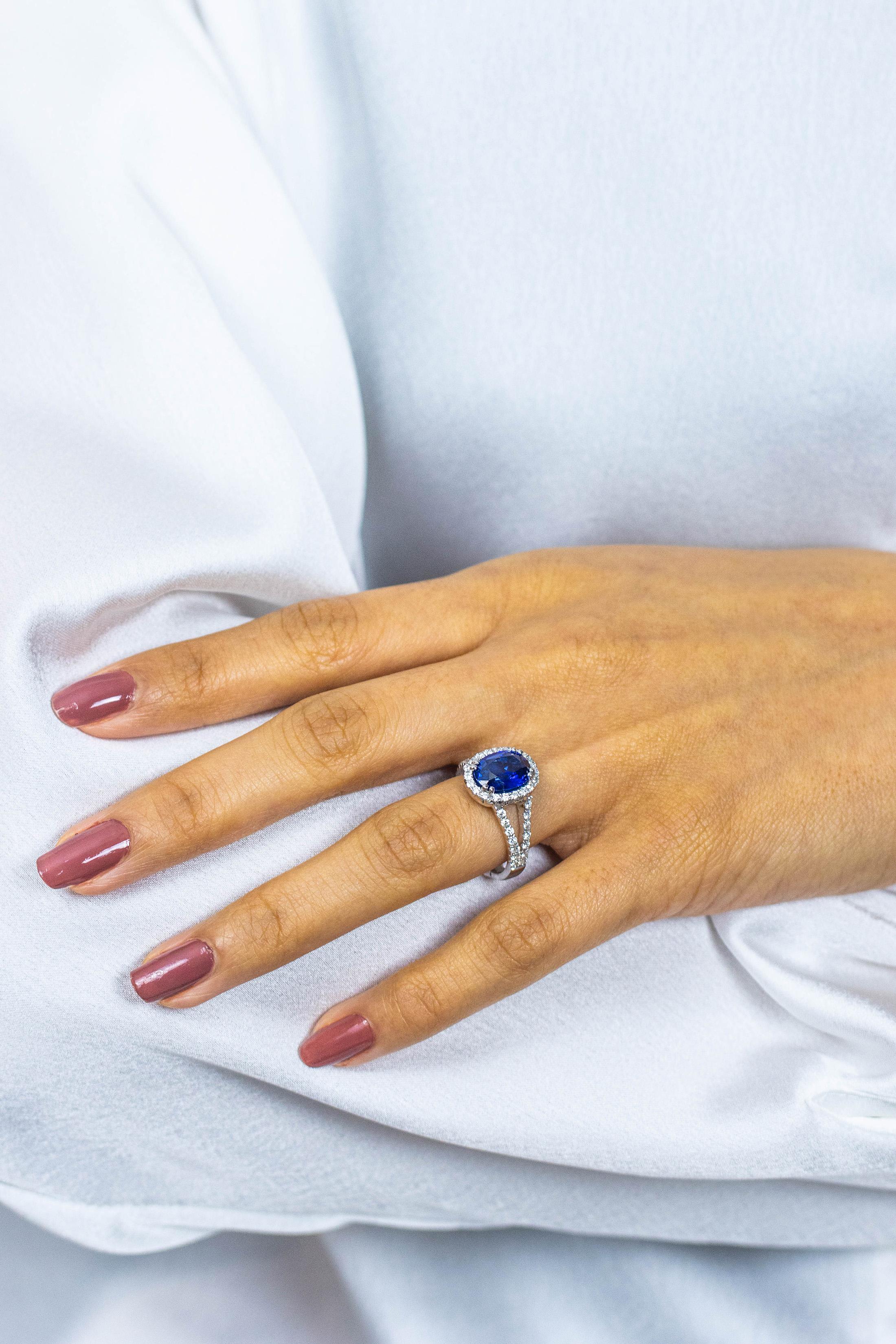 GIA Certified 2.68 Carat Oval Cut Heated Sri Lanka Sapphire Halo Engagement Ring For Sale 2