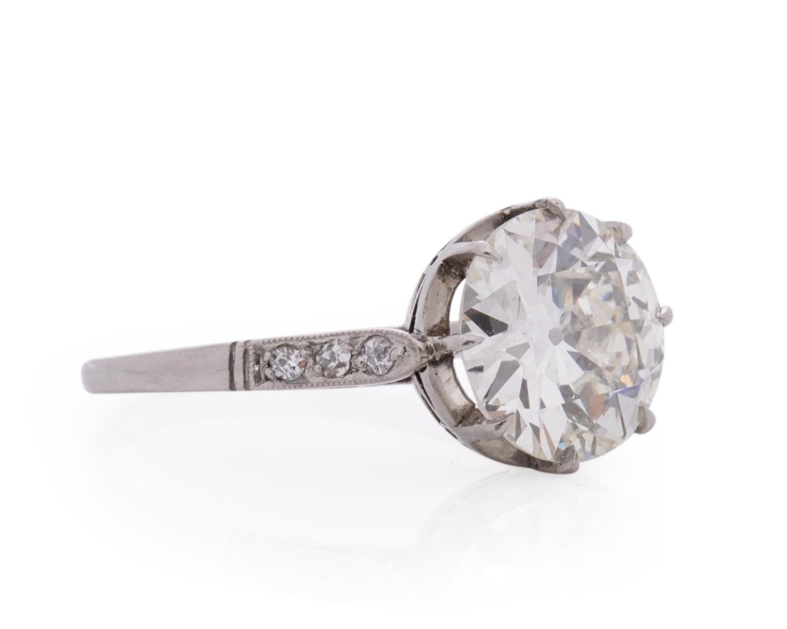 Item Details: 
Ring Size: 7.5
Metal Type: Platinum [Hallmarked, and Tested]
Weight: 3.5 grams

Center Diamond Details:
GIA REPORT #: 6214255804
Weight: 2.69 Carat
Cut: Old European brilliant
Color: K
Clarity: SI1
Measurements: 9.38 x 9.31 x