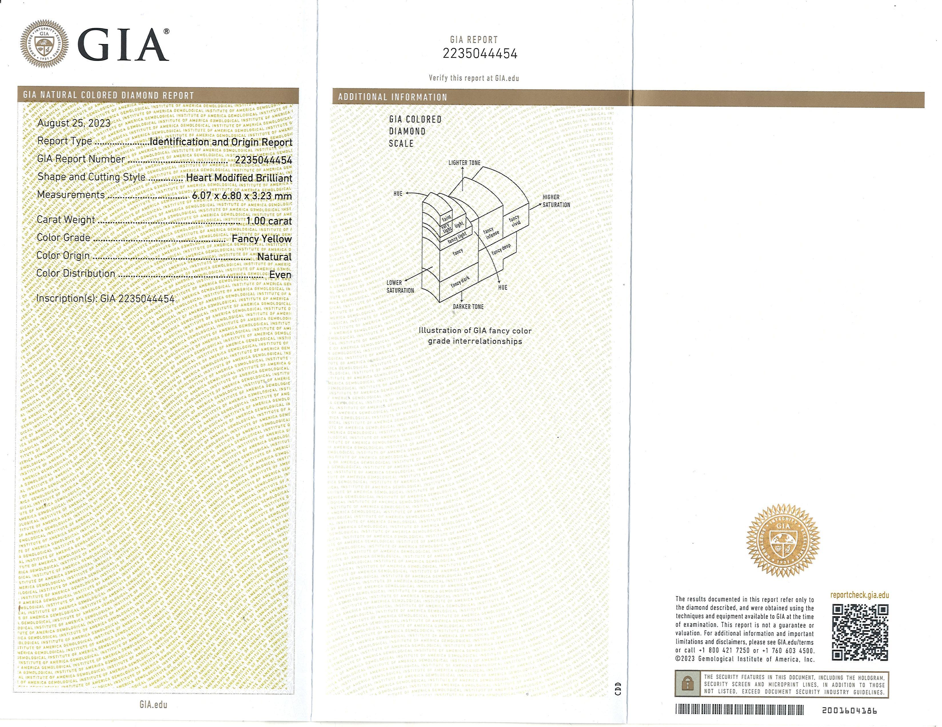 GIA zertifiziert 2.70Ctw Fancy Gelb Herz Diamant Halo Ohrstecker 18K Gold im Zustand „Neu“ im Angebot in New York, NY