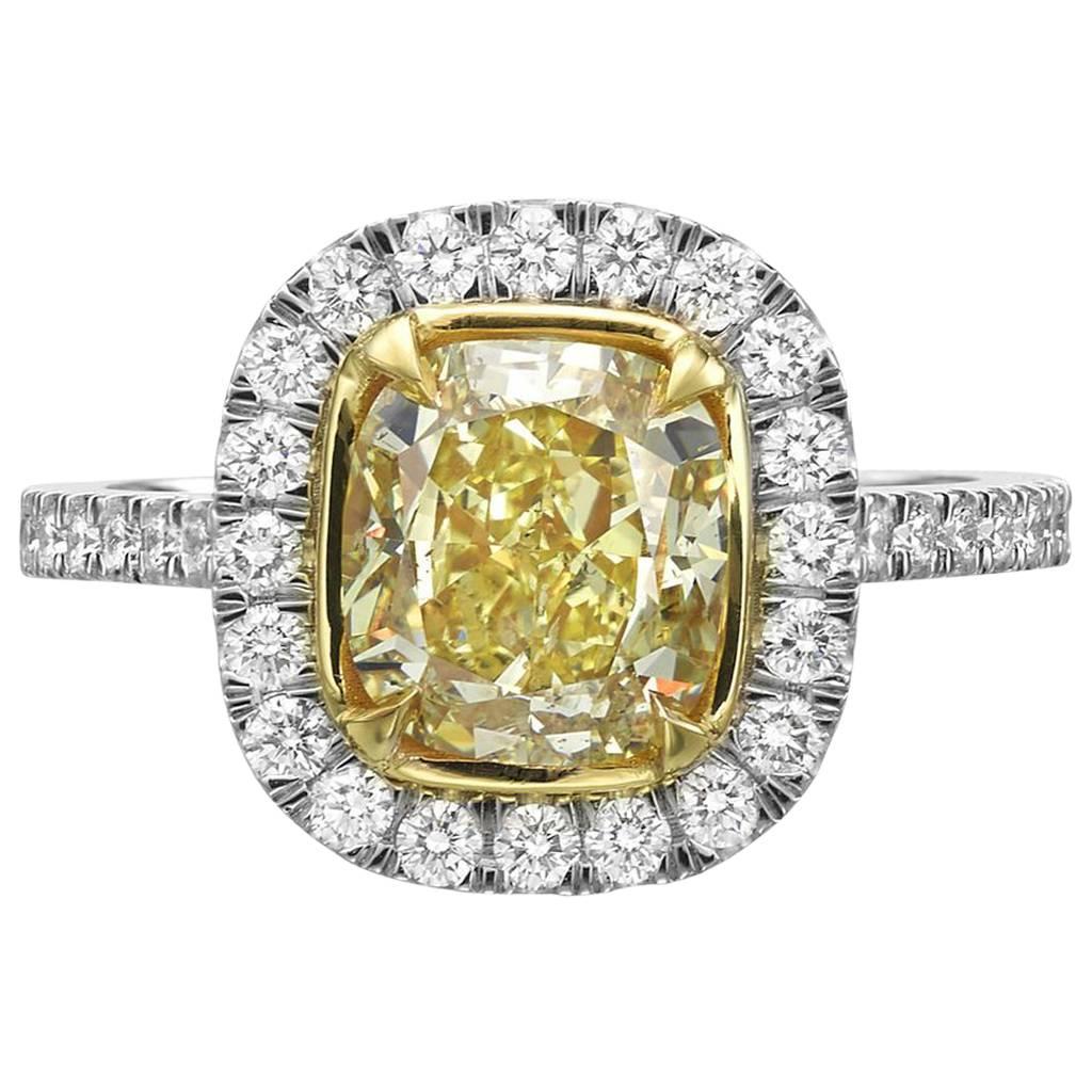 GIA Certified 2.71 Carat Fancy Yellow Cushion Cut Diamond Halo Engagement Ring For Sale