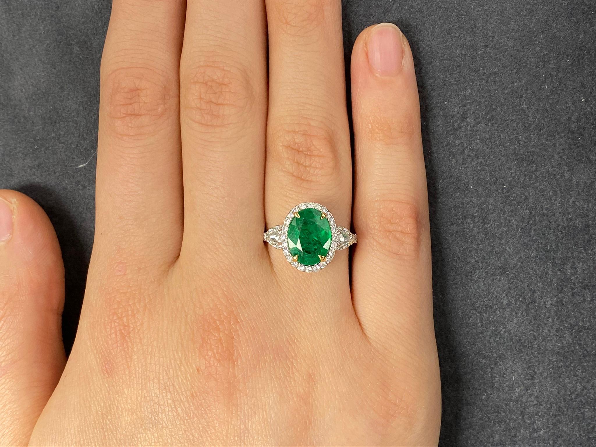 GIA Certified 2.72 Carat Oval Emerald and Diamond Ring In New Condition In Great Neck, NY