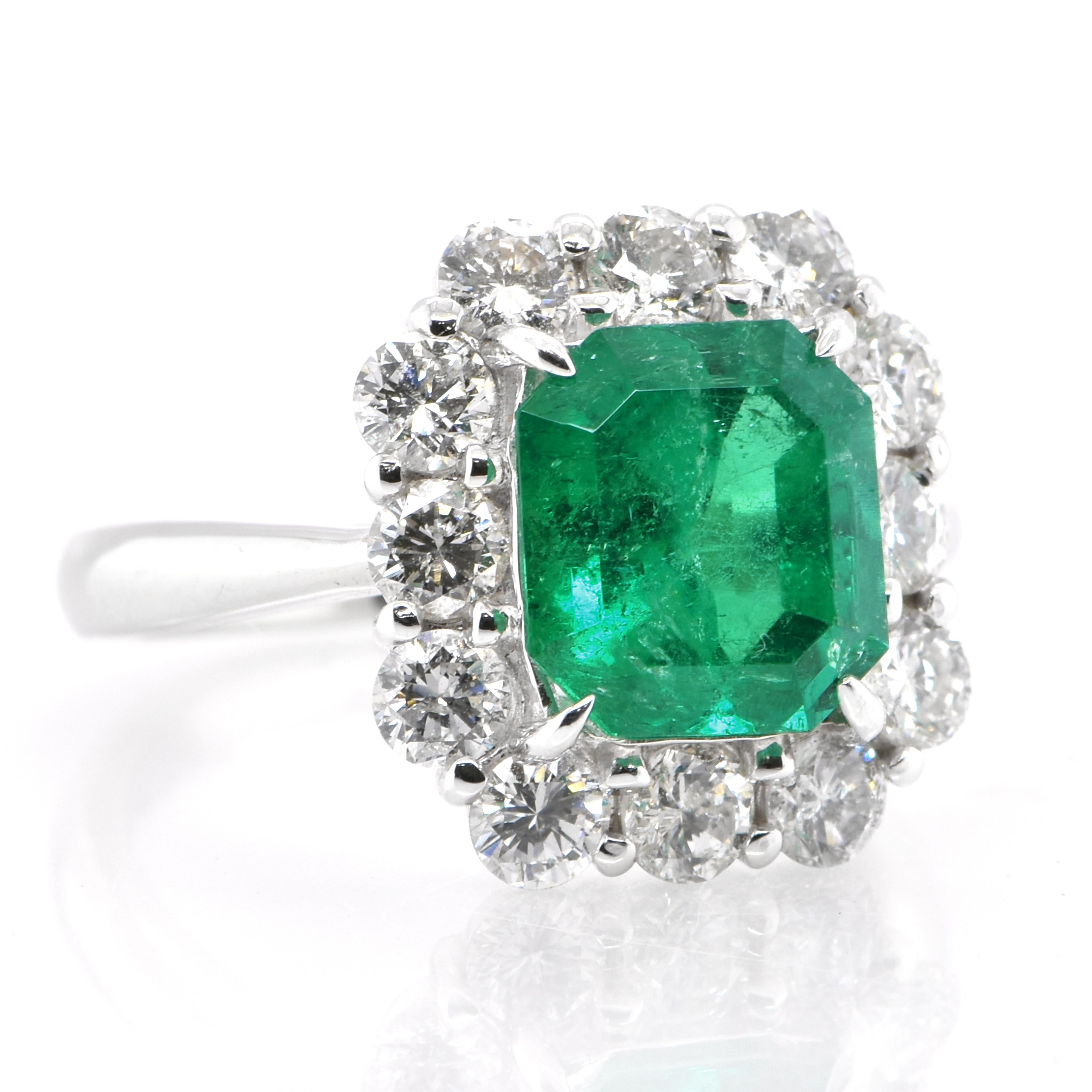 Modern GIA Certified 2.73 Carat Natural Colombian Emerald Diamond Ring Set in Platinum For Sale