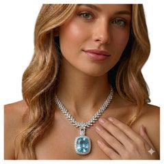 Collar de oro blanco con diamante redondo y aguamarina de 27,34 quilates certificado por GIA